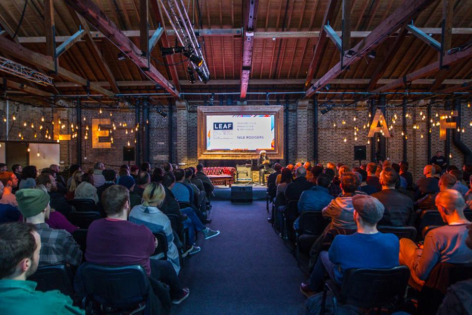 East Mall industrial-chic theater setup for corporate events and brand conferences at Tobacco Dock.