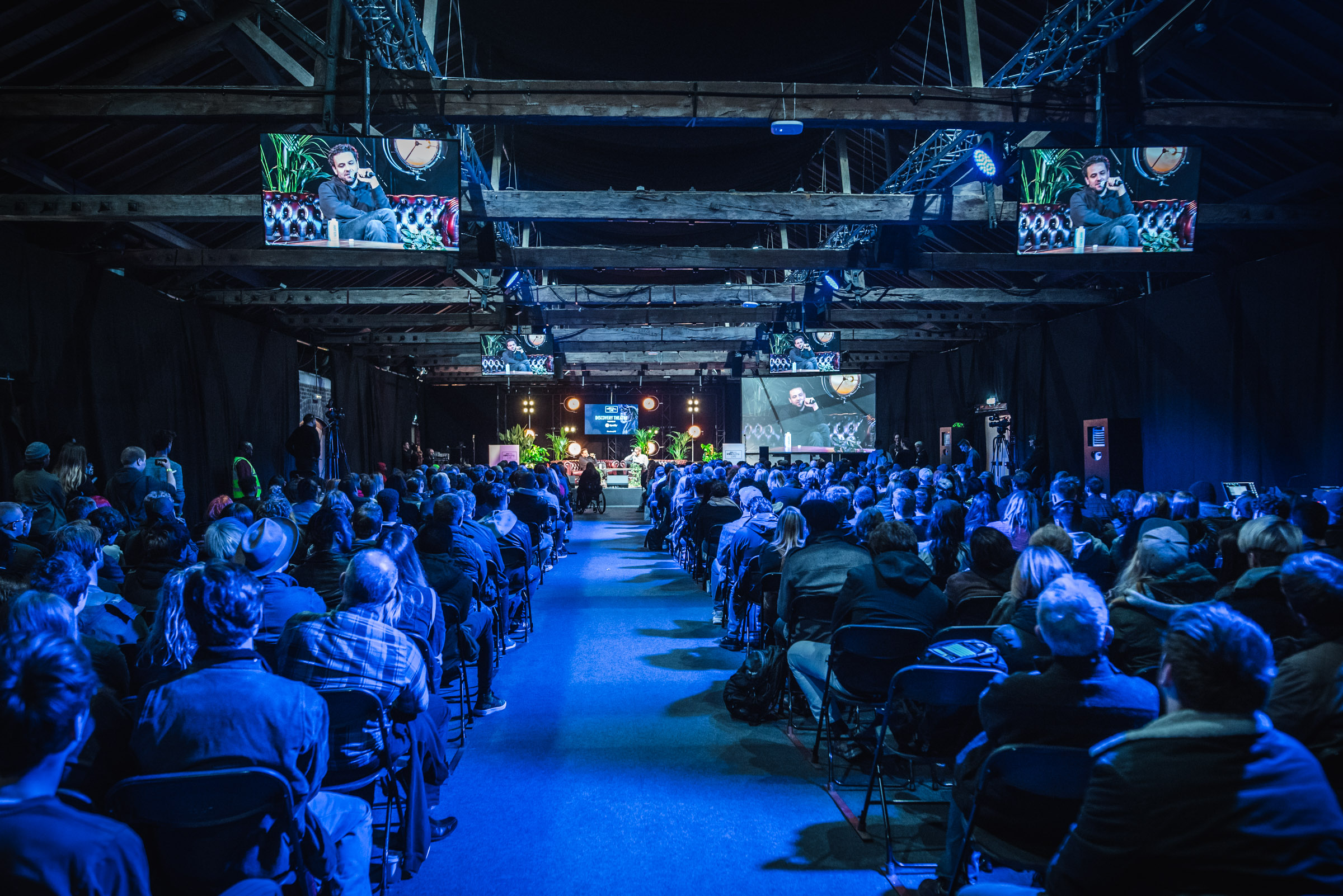 Keynote session at Tobacco Dock featuring professional AV rigging for corporate events.