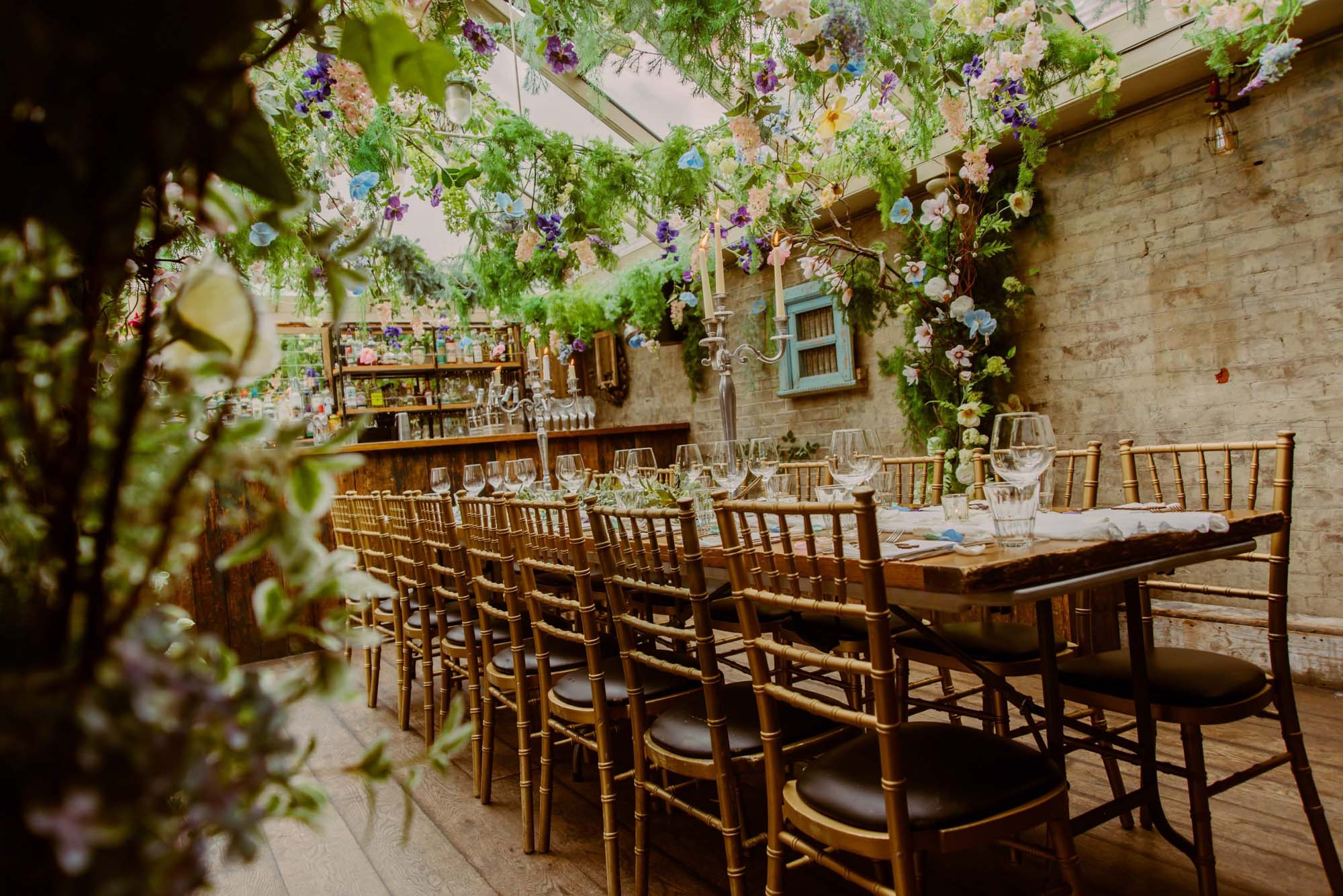 Elegant dining space with wooden table, ideal for corporate events and gatherings.