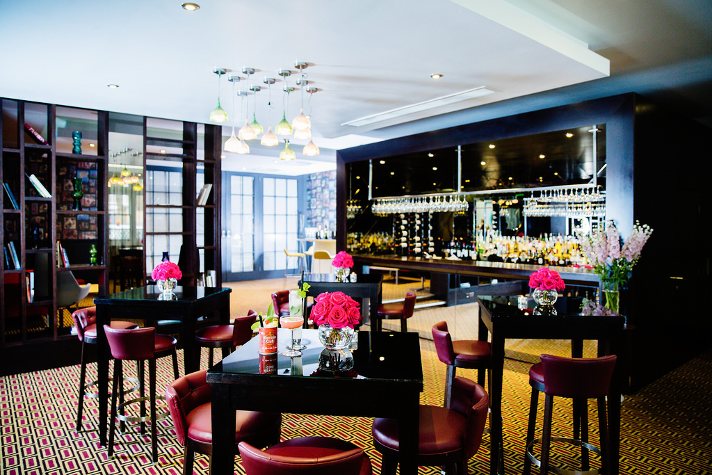 Mal Lounge in Malmaison London, elegant event space with floral centerpieces for gatherings.