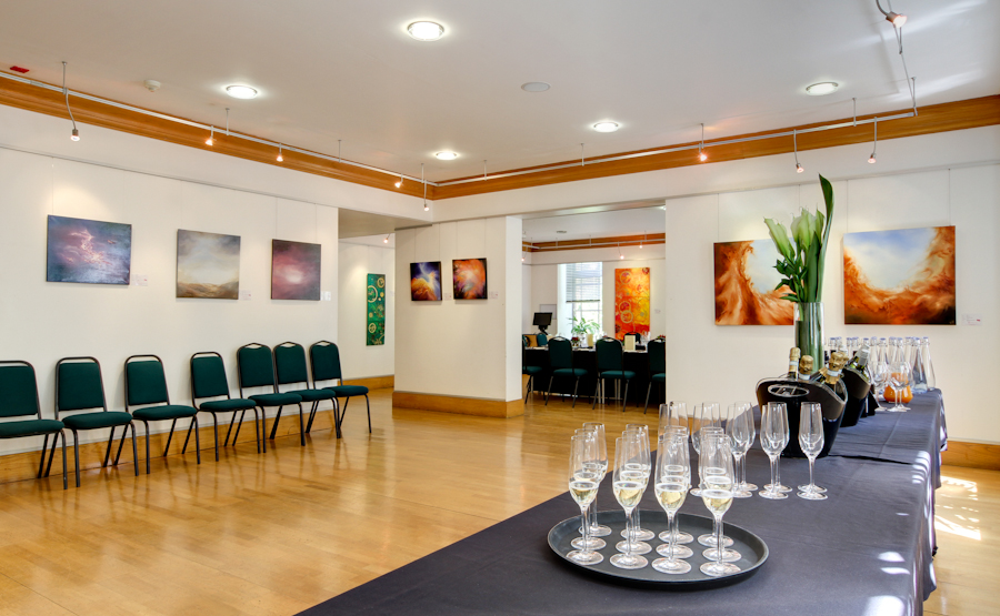 Elegant Knapp Gallery event space with stylish table setup for networking receptions.