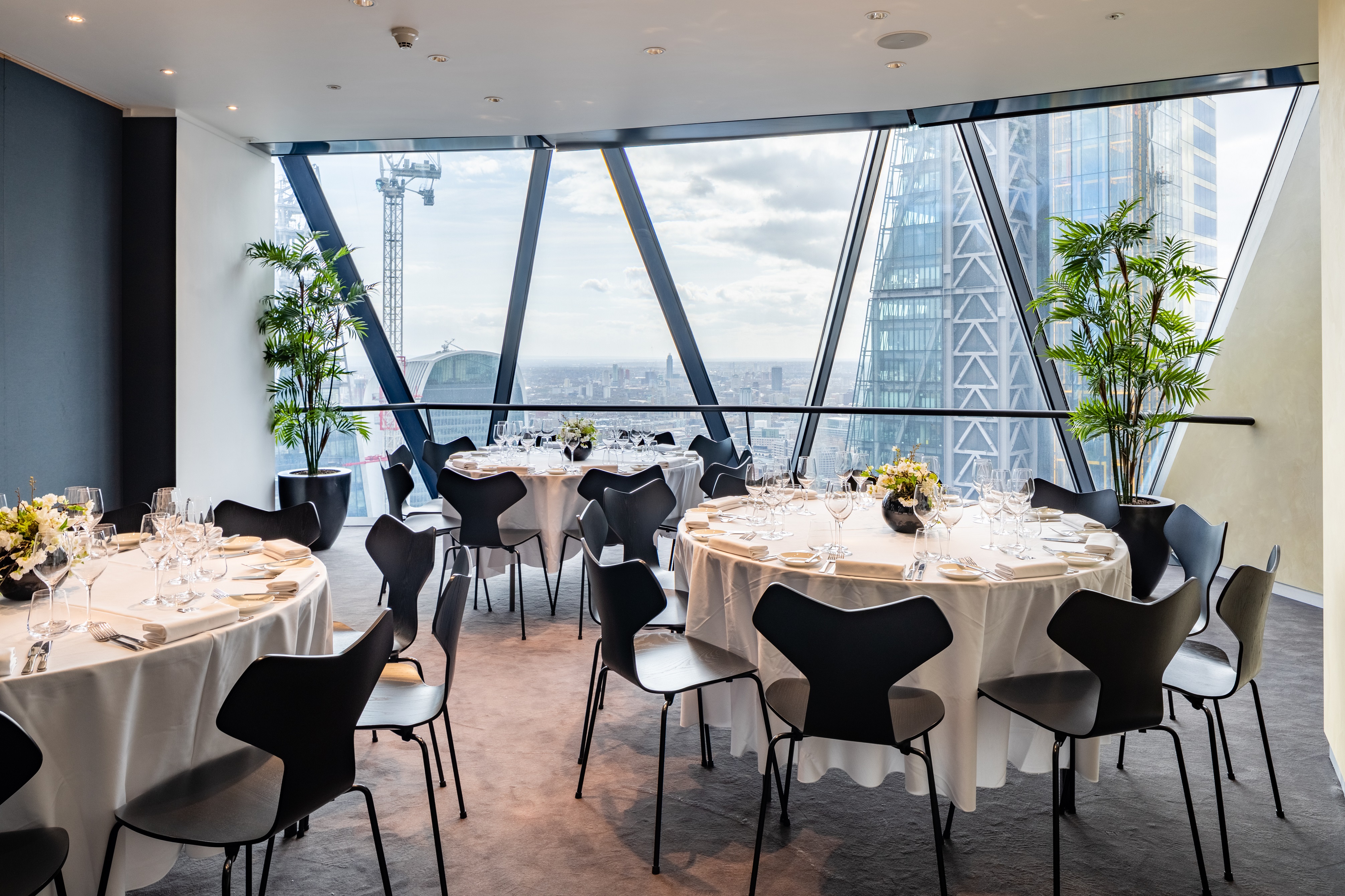 Sophisticated event space with skyline view, ideal for corporate meetings and celebrations.