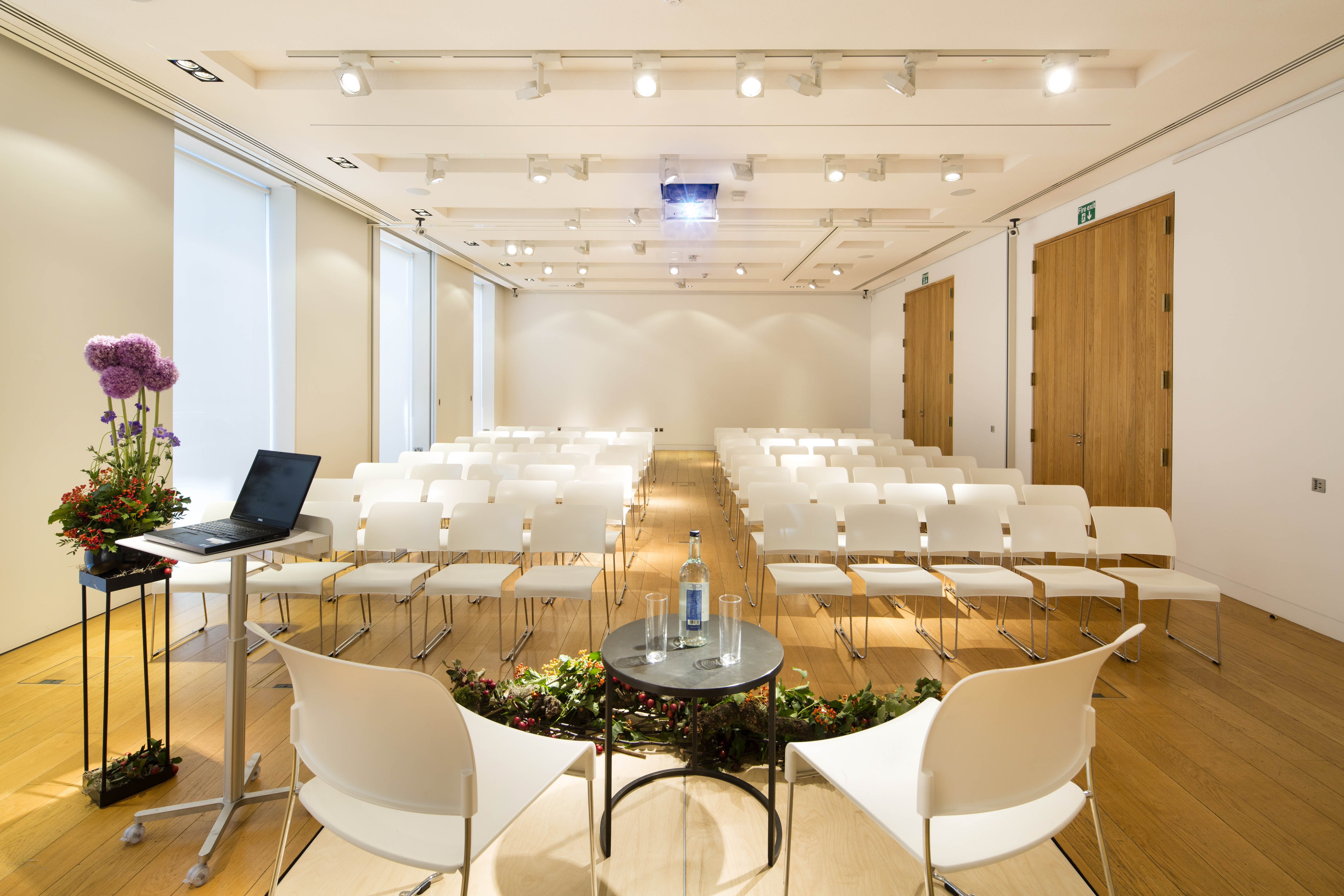 Exhibition Room at The Goldsmiths' Centre with modern setup for corporate meetings and events. - Banner
