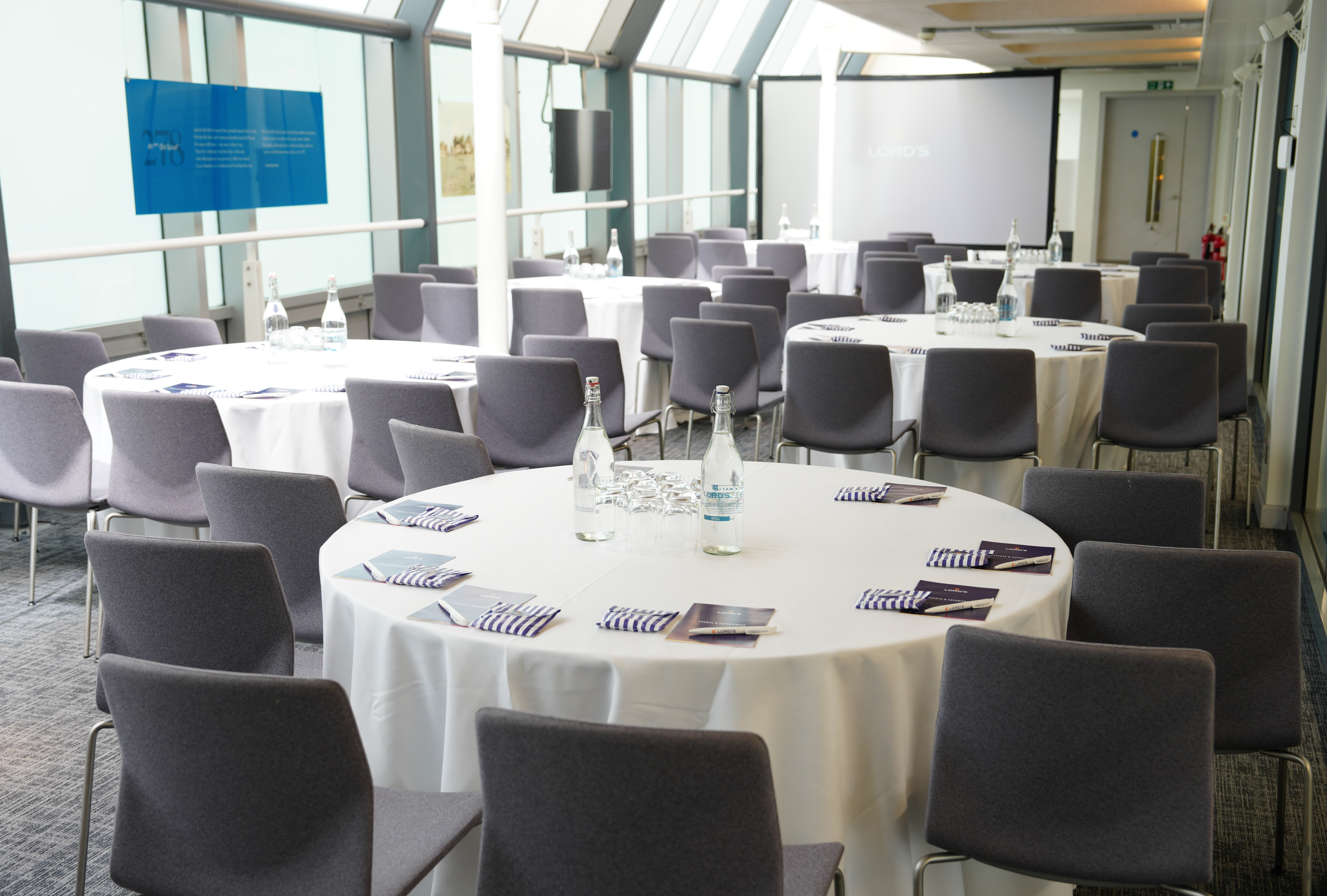 Corporate banquet setup at Lord's Cricket Ground: bright, professional venue for gala lunches.