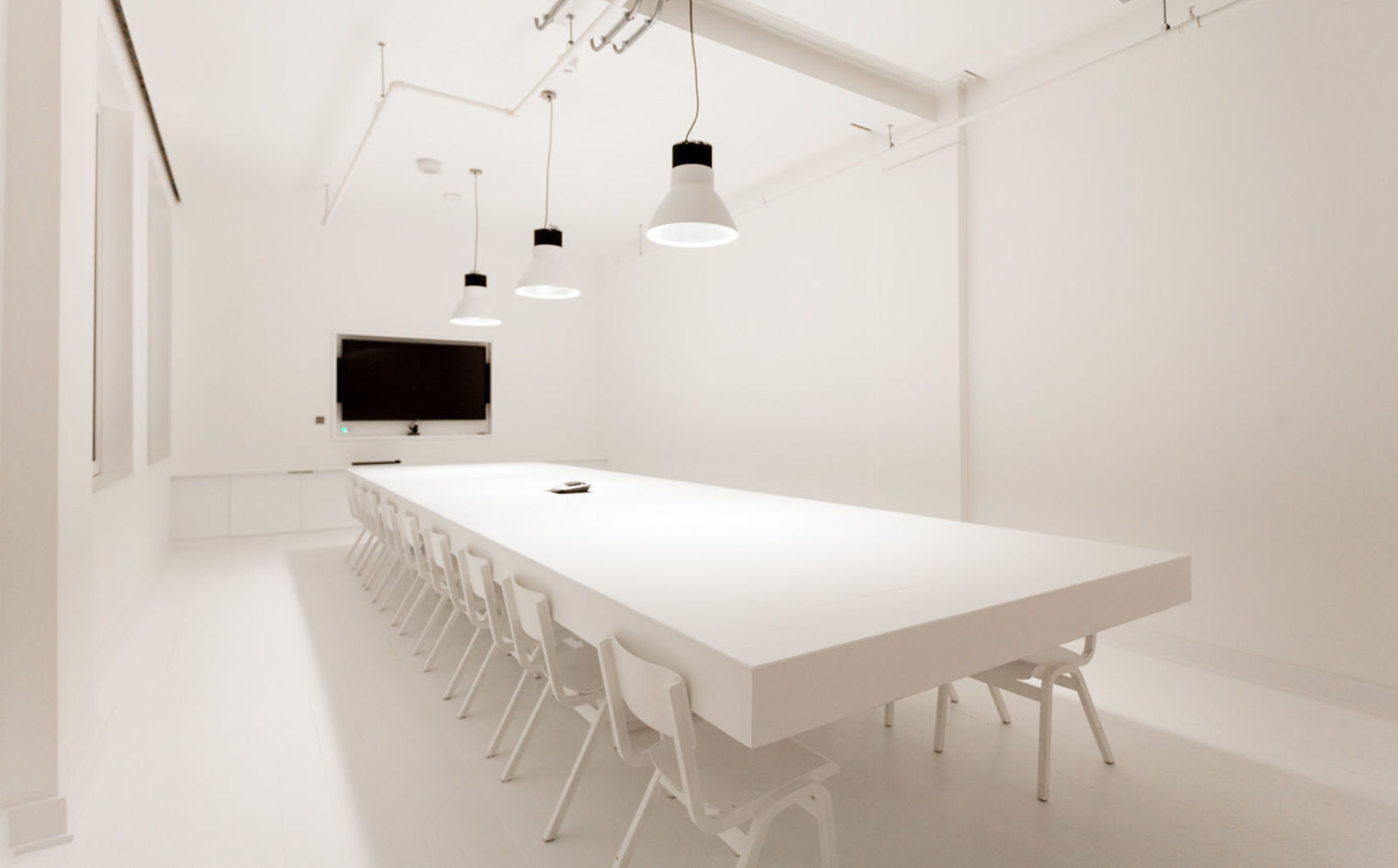 Cupertino Meeting Room at Huckletree Shoreditch, sleek design for professional gatherings.