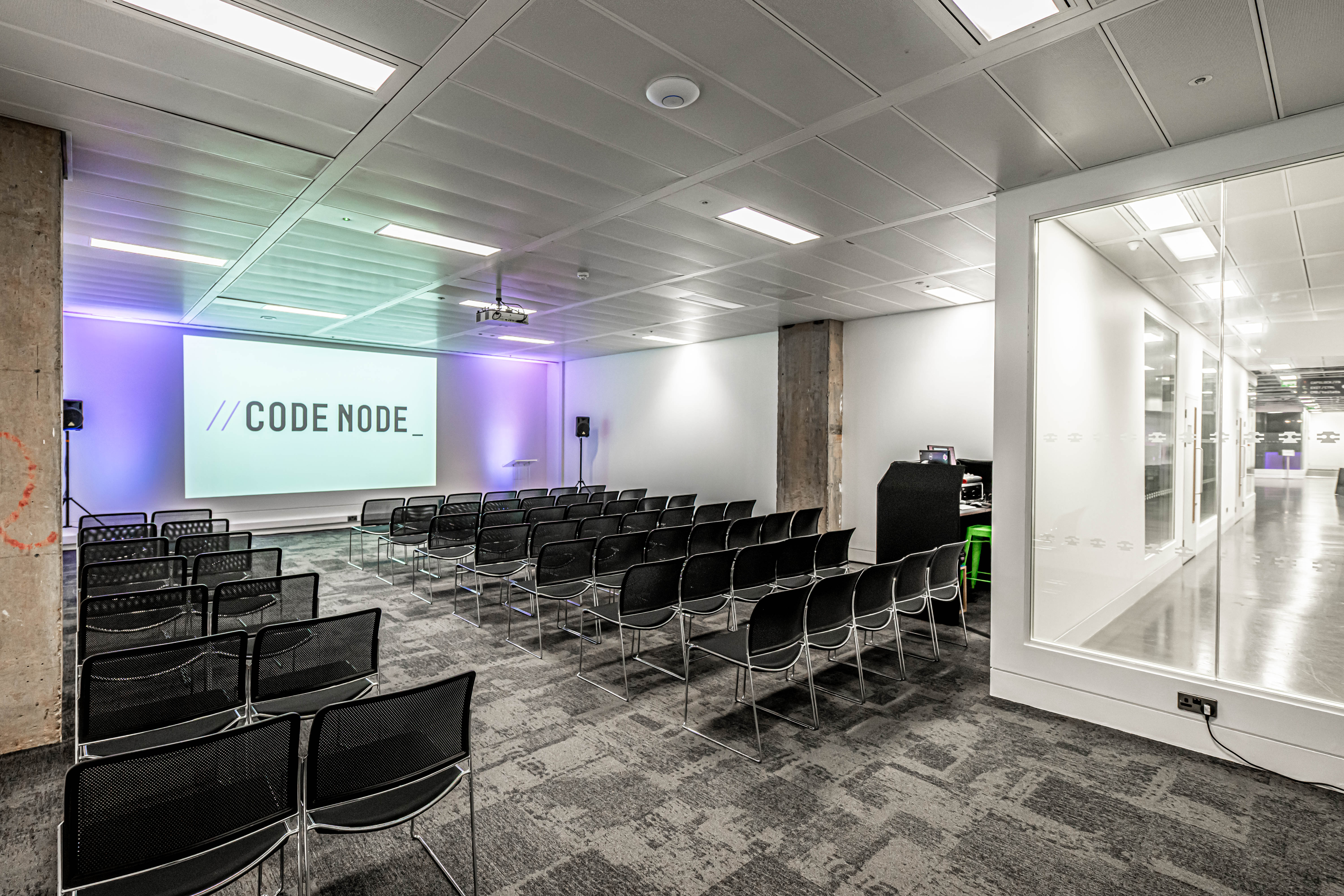Modern event space, projector, tech conference, workshop