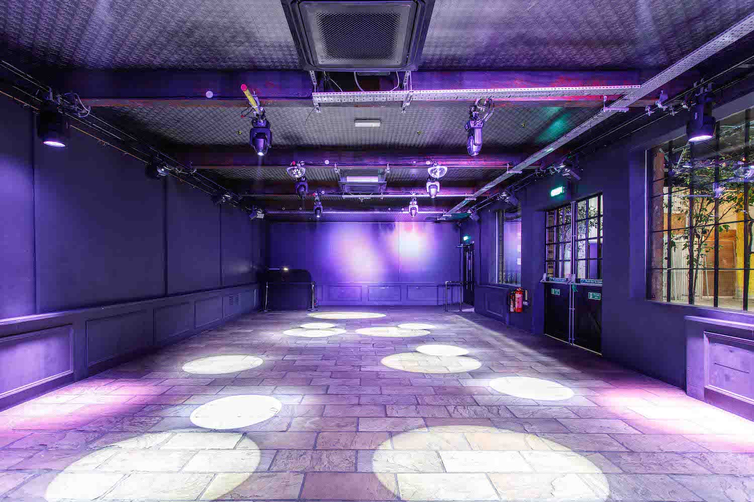 Industrial event space, stage, product launch, concert