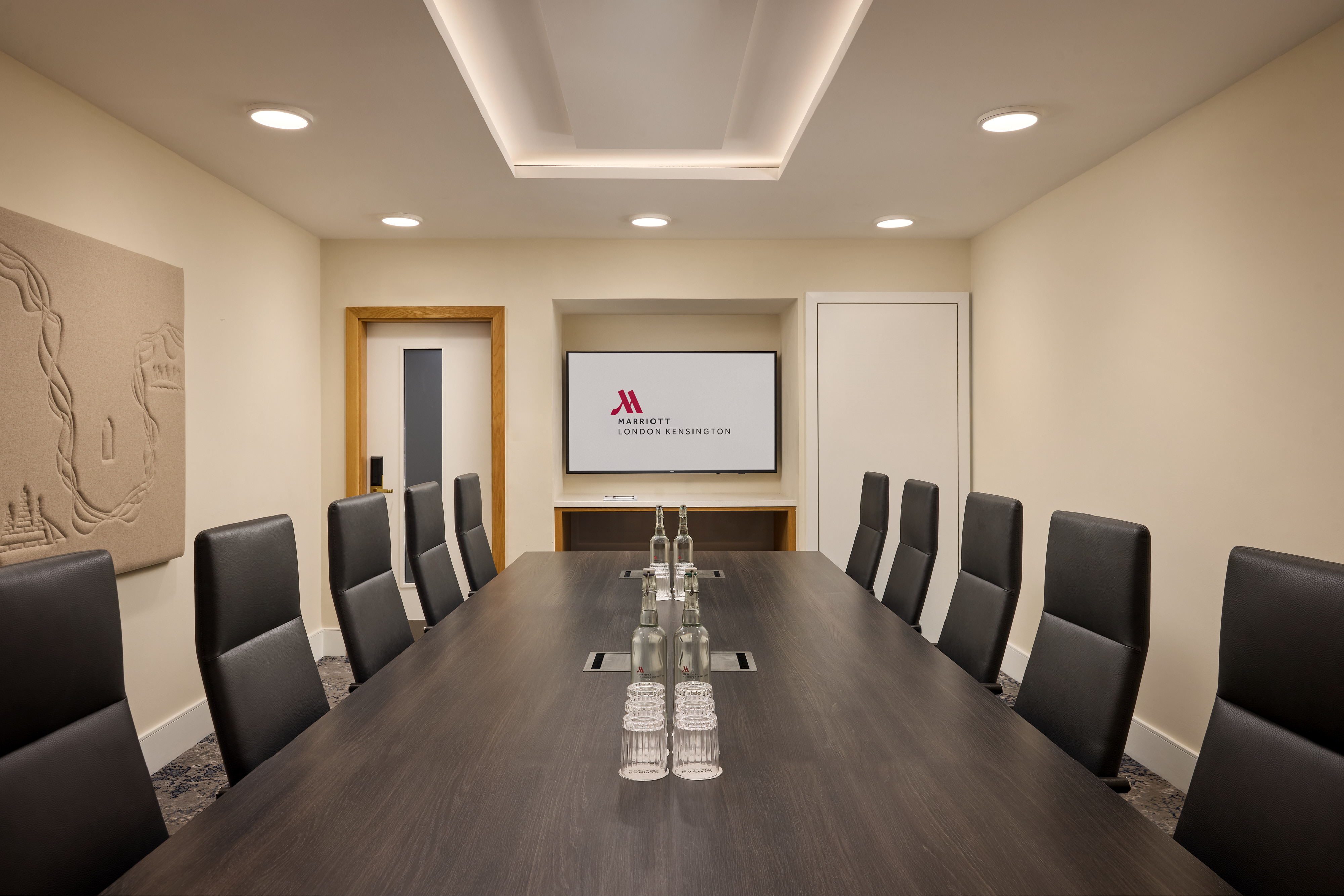 Tech-enabled boardroom at London Marriott Hotel Kensington for executive meetings and events.