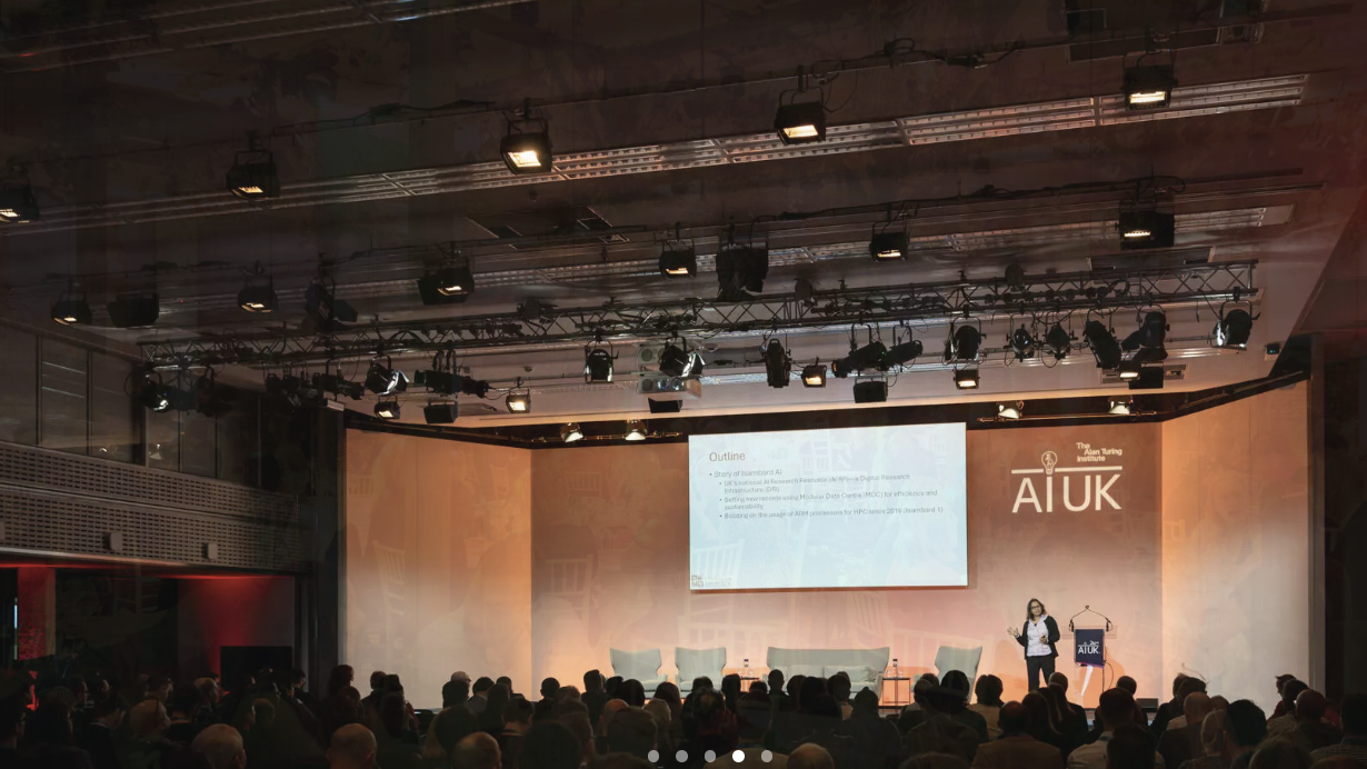 QEII Centre conference, stage with screen & speakers, event production