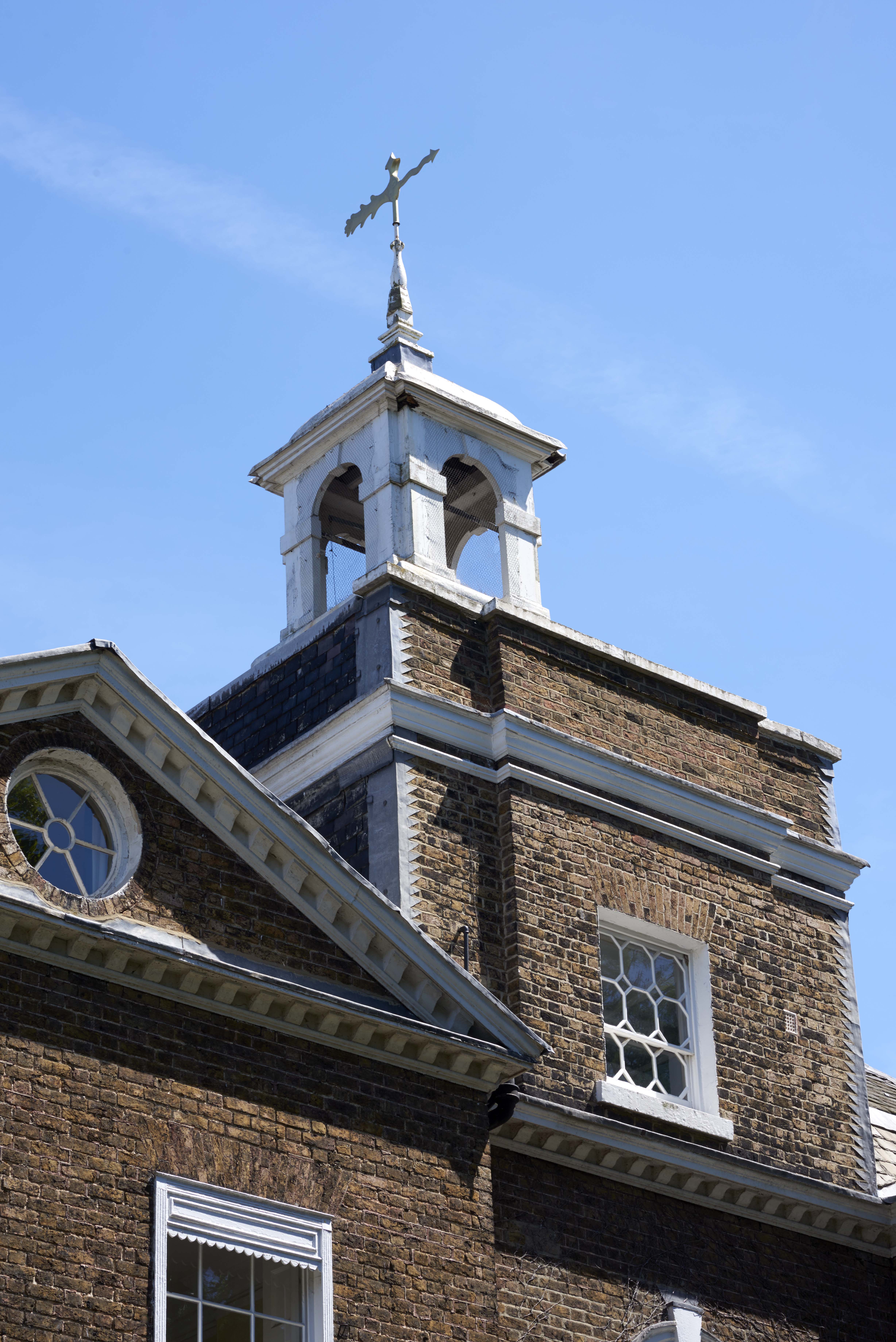 Historic Bell House venue with elegant bell tower, perfect for unique events and gatherings. - Banner