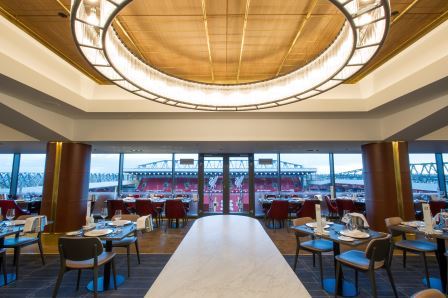Executive Lounge at Liverpool FC: modern dining space for corporate events and gatherings.