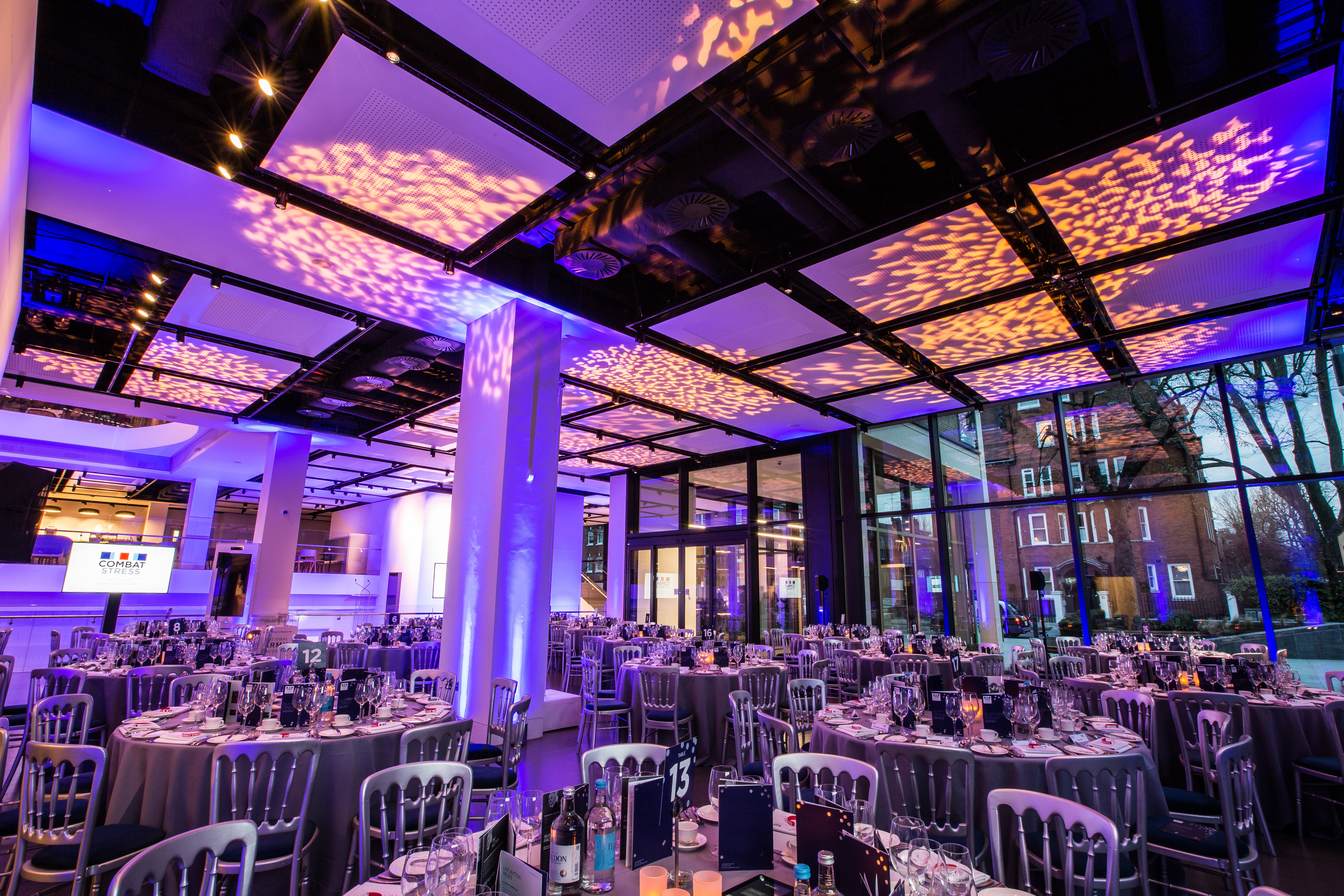 Elegant dinner setup in National Army Museum foyer for corporate events and gala dinners.