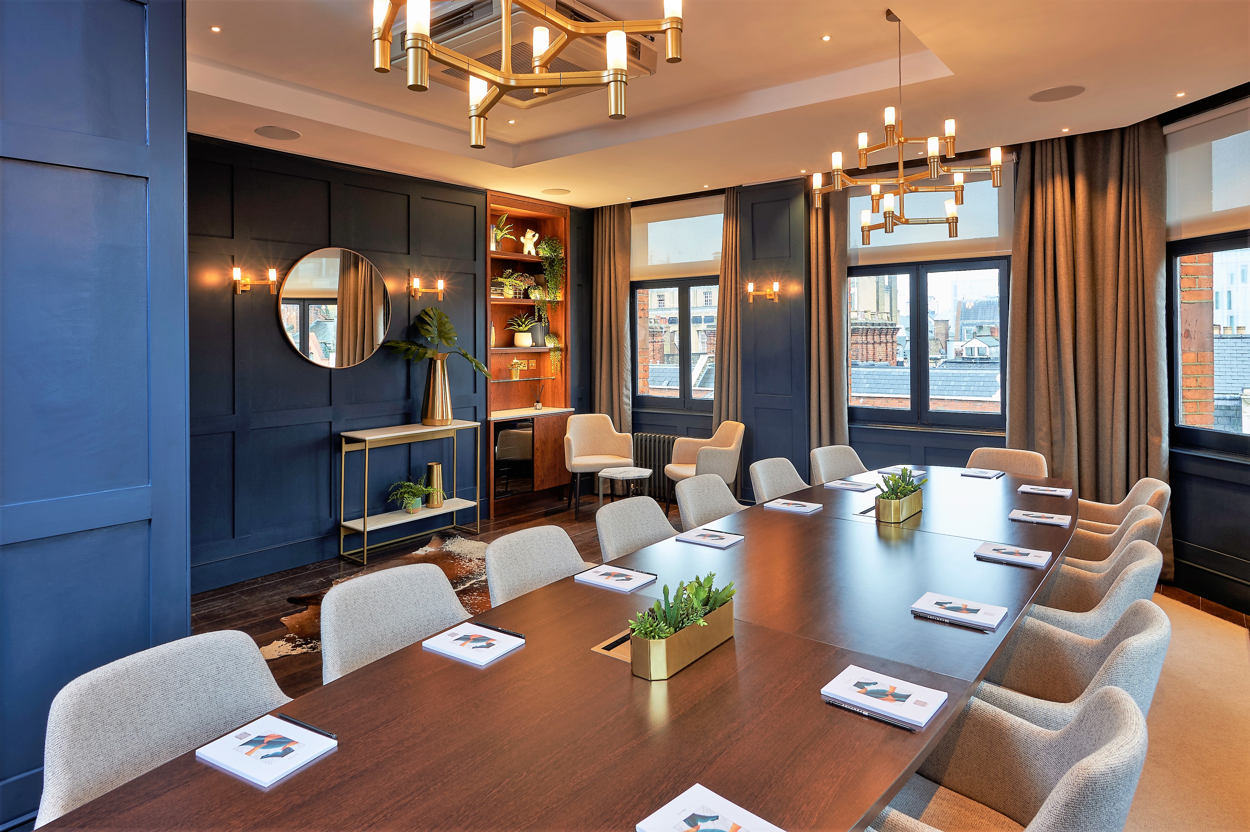 Modern meeting room at The Shaftesbury, featuring elegant table and natural light for events.