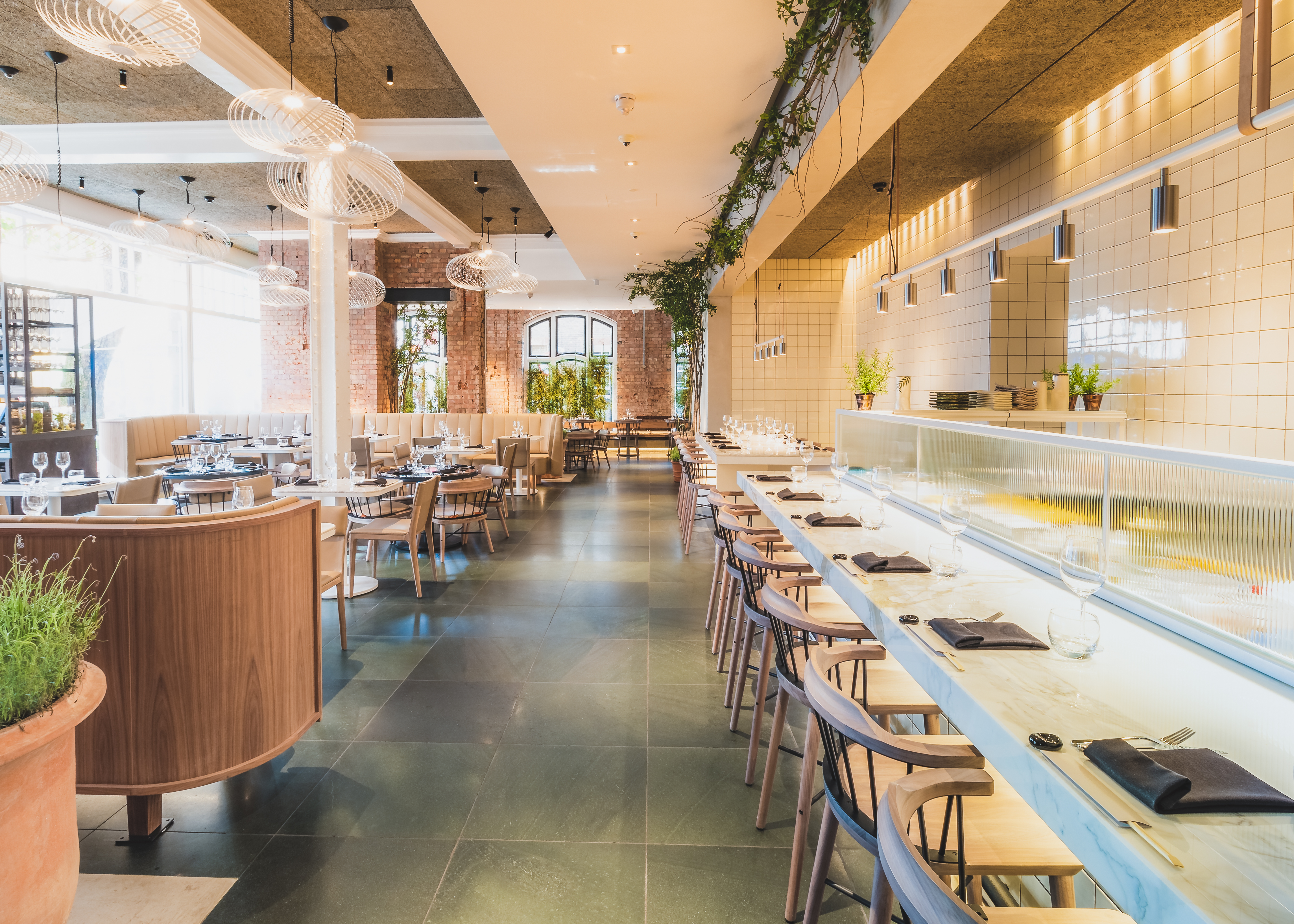 Folio 2 venue, Radisson Blu London, with booth seating for corporate dinners and networking events.