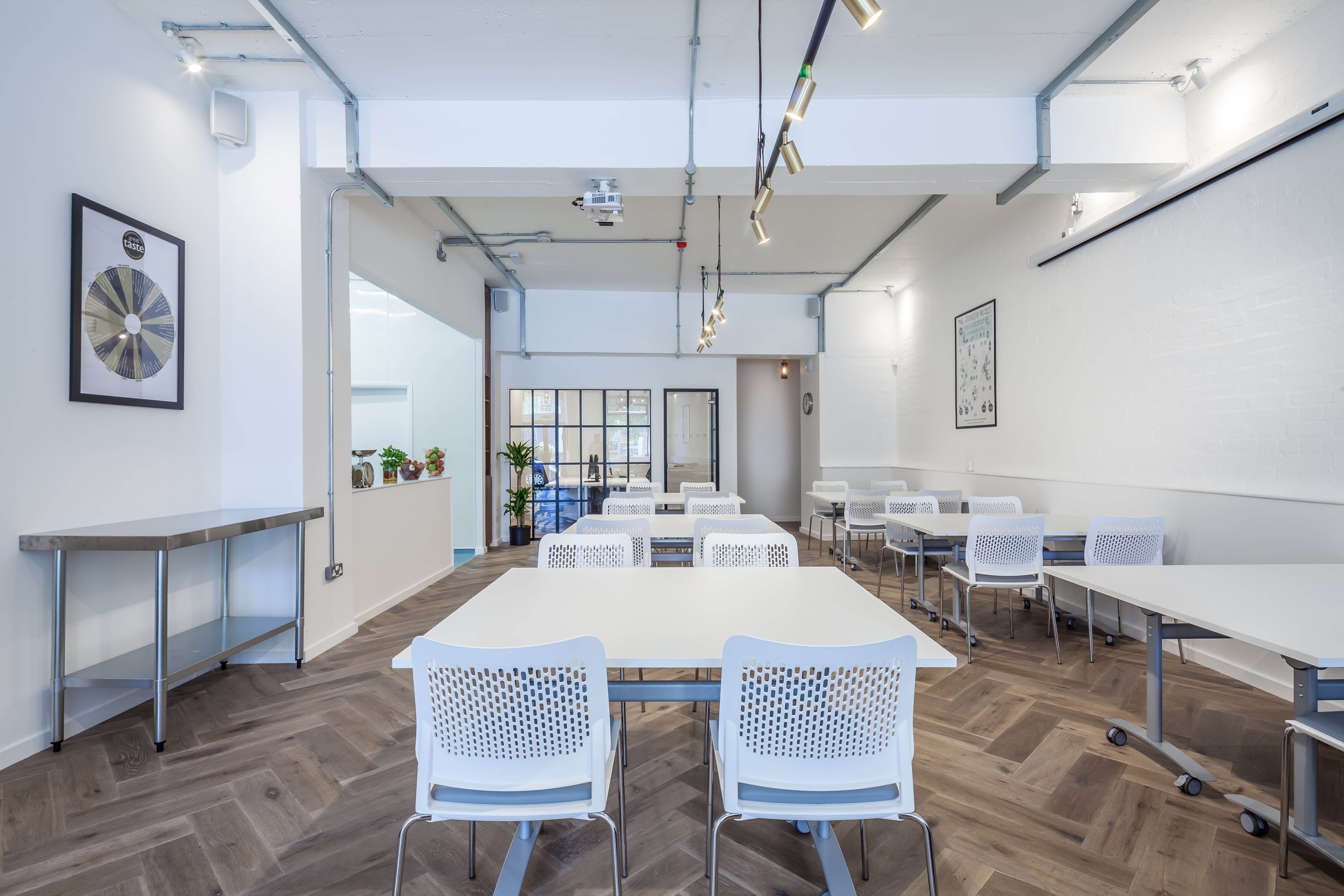 Versatile meeting space in Guild of Fine Food, ideal for workshops and conferences. - Banner