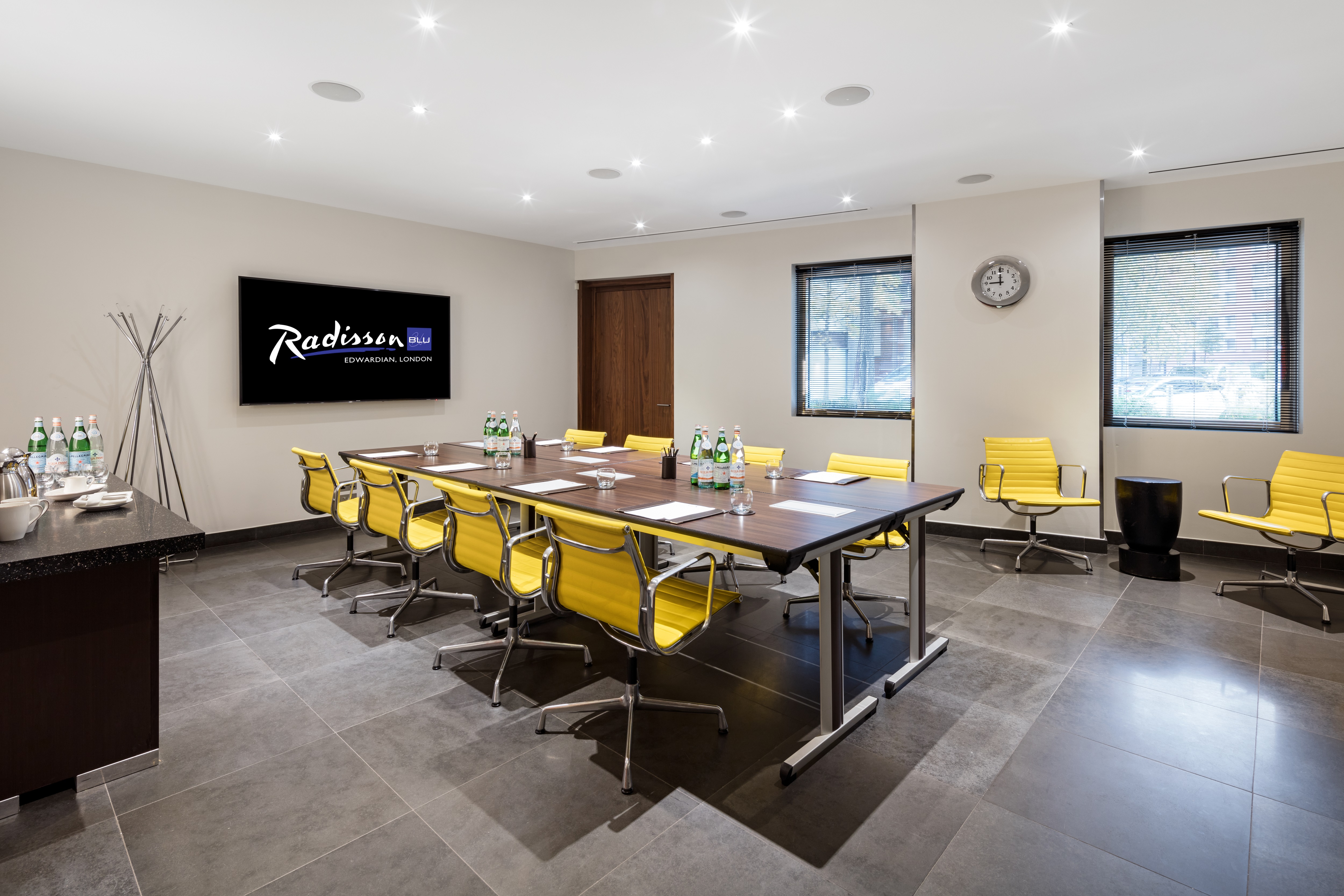 Modern meeting room with ergonomic chairs at Radisson Blu for productive events. - Banner