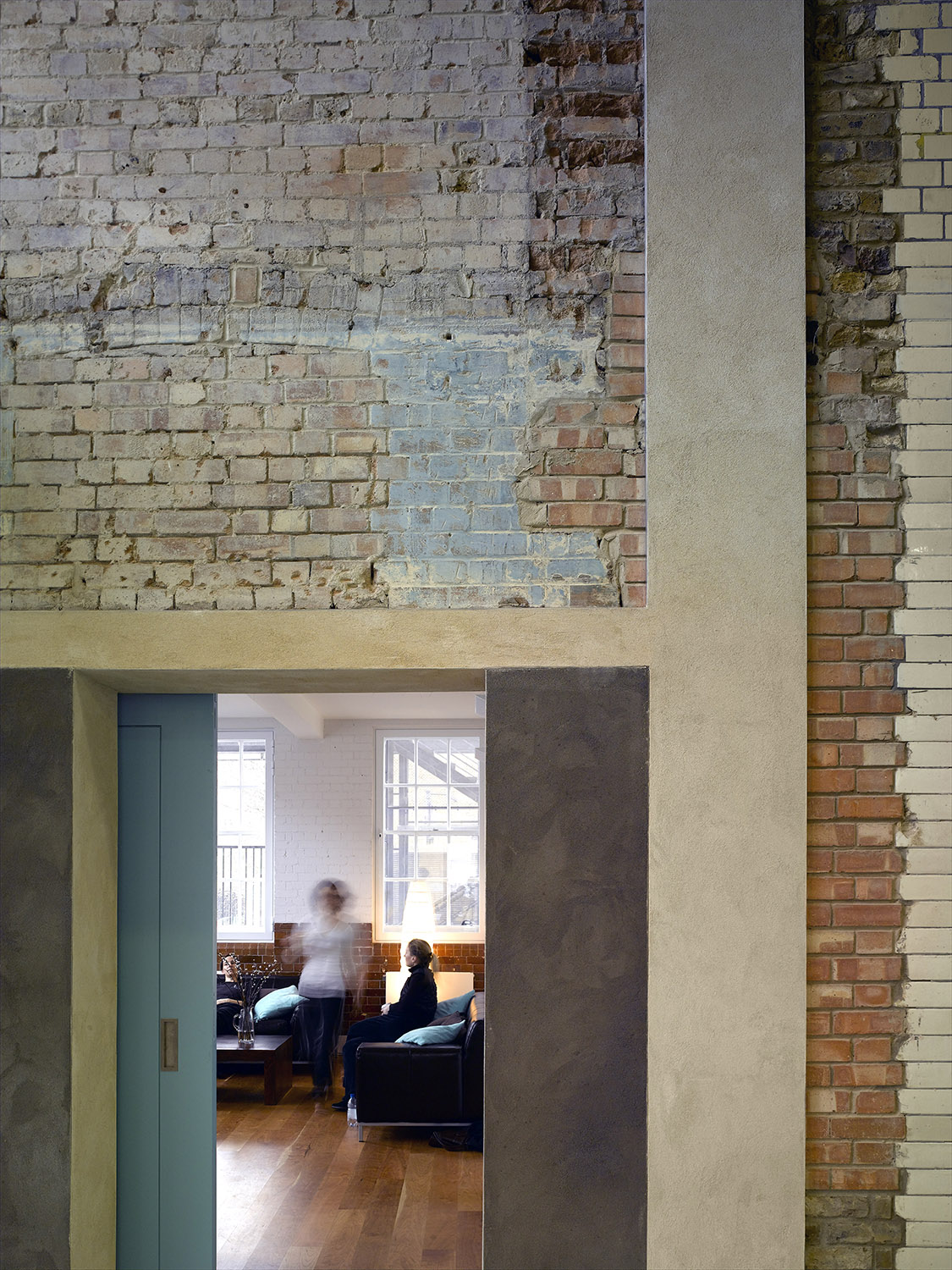 Modern event space at Siobhan Davies Studios with brick walls, ideal for workshops and networking.
