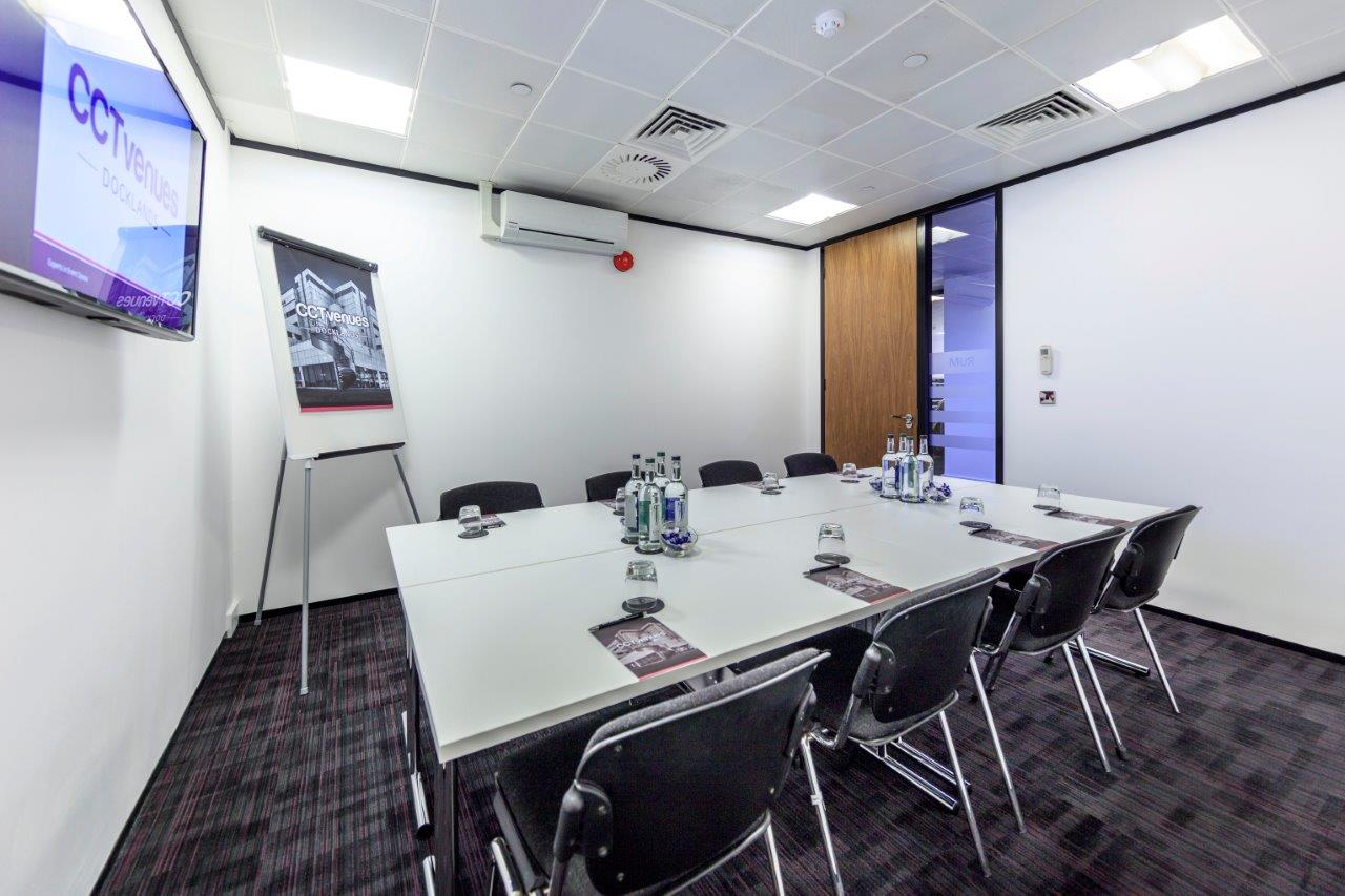 Boardroom at Docklands Sailing & Watersports Centre with integrated tech for corporate meetings.