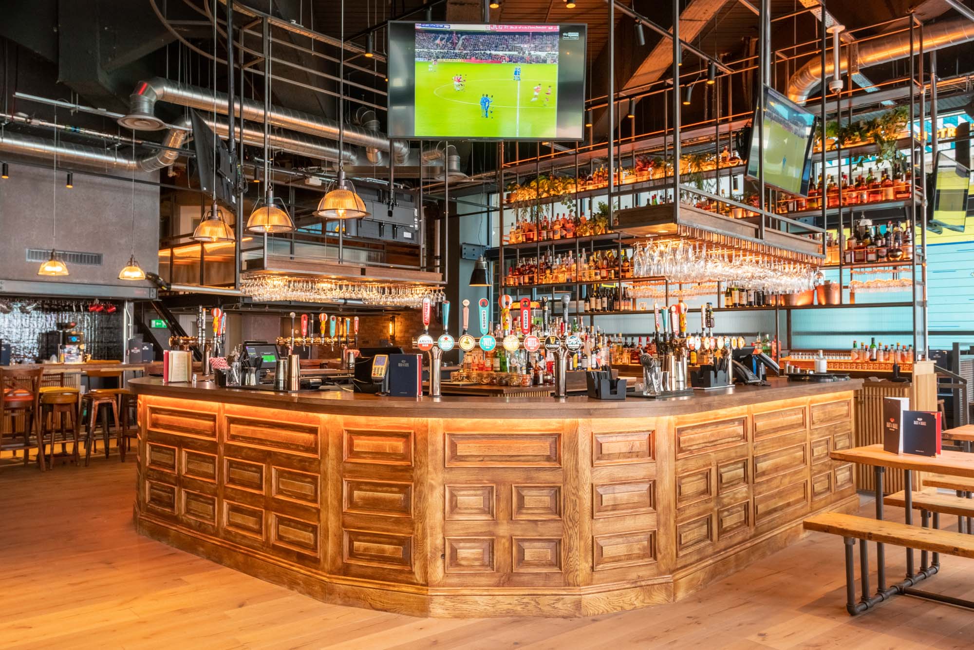 Modern bar venue for corporate parties and conferences in Bat & Ball, ideal for networking.