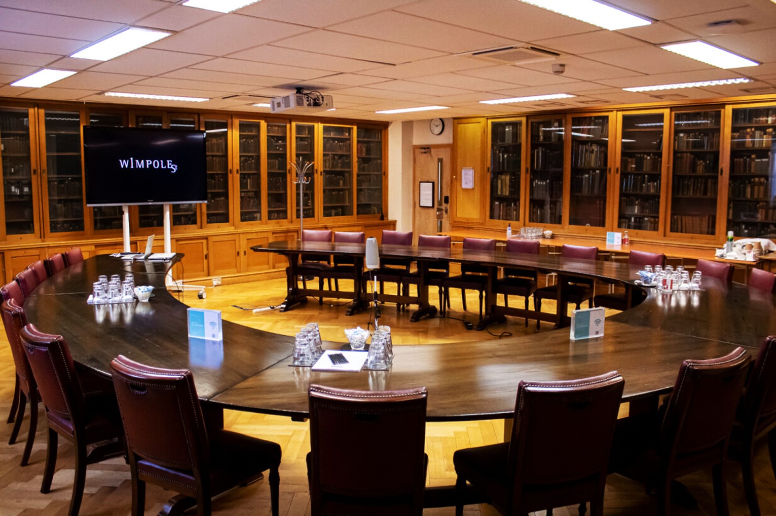 Marcus Beck Library meeting room with circular table, ideal for professional gatherings.