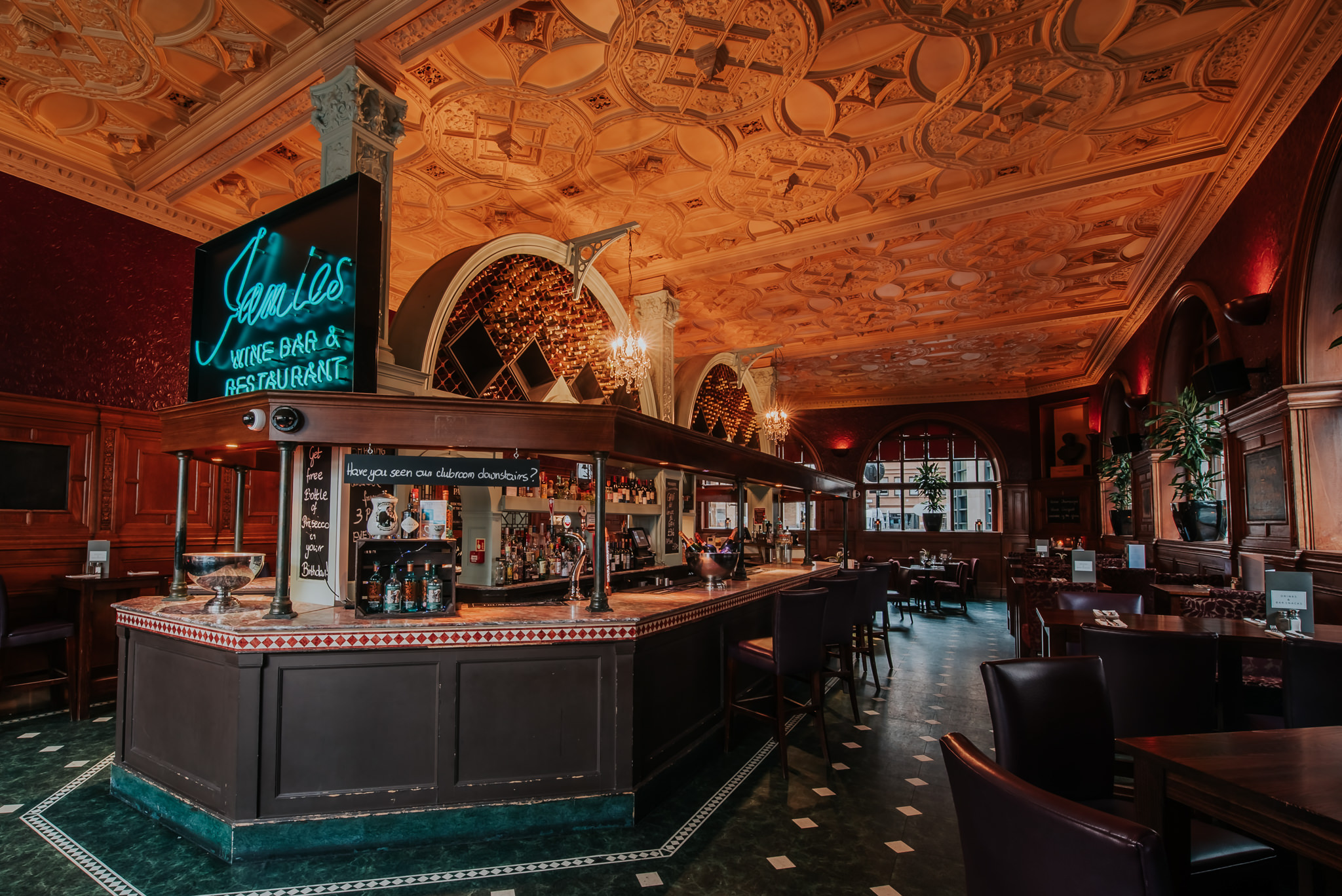 Sophisticated bar and restaurant venue with elegant decor for gatherings and events.
