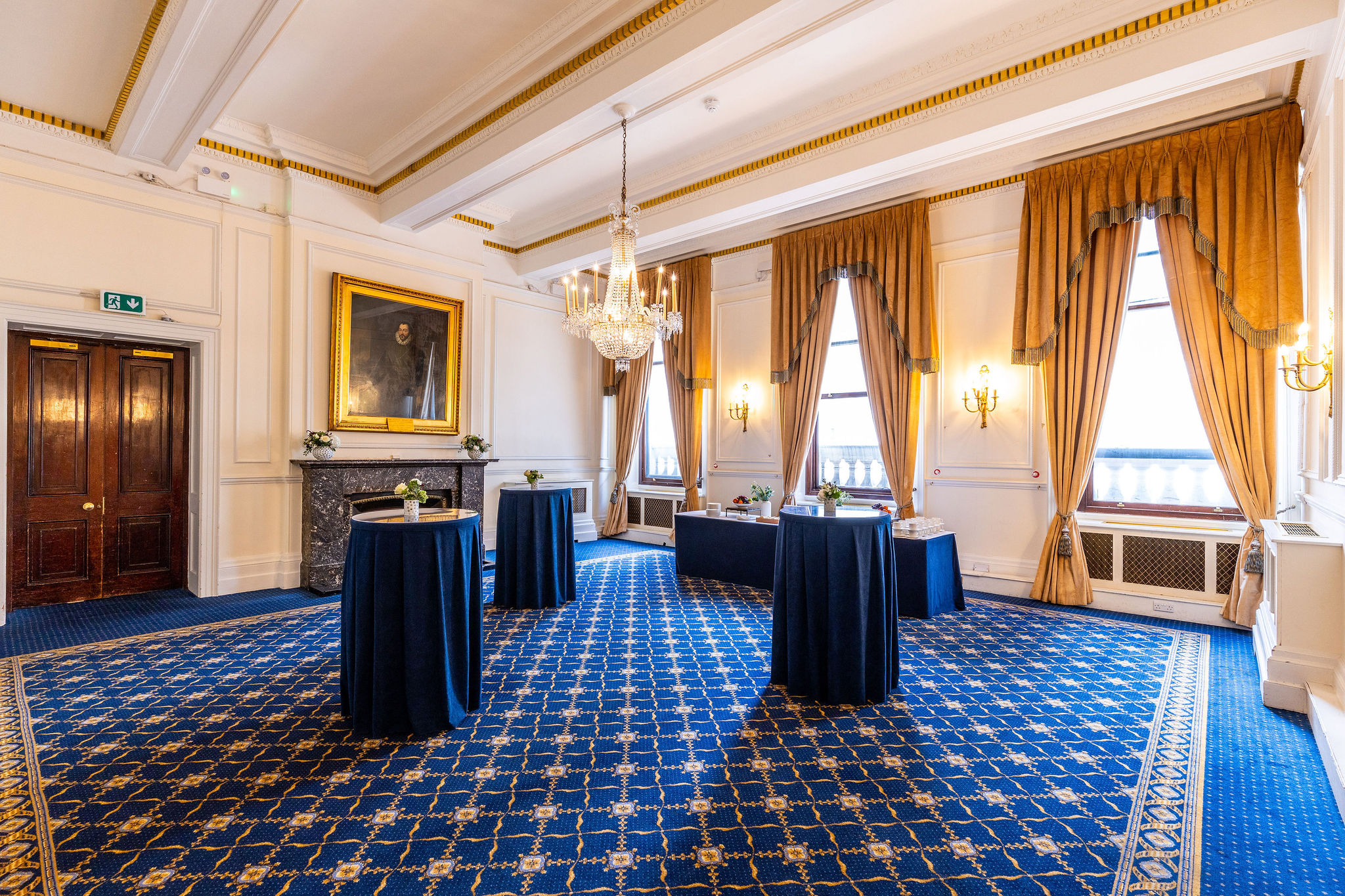 Trafalgar Rooms at 116 Pall Mall with gold accents for networking events and cocktail receptions.