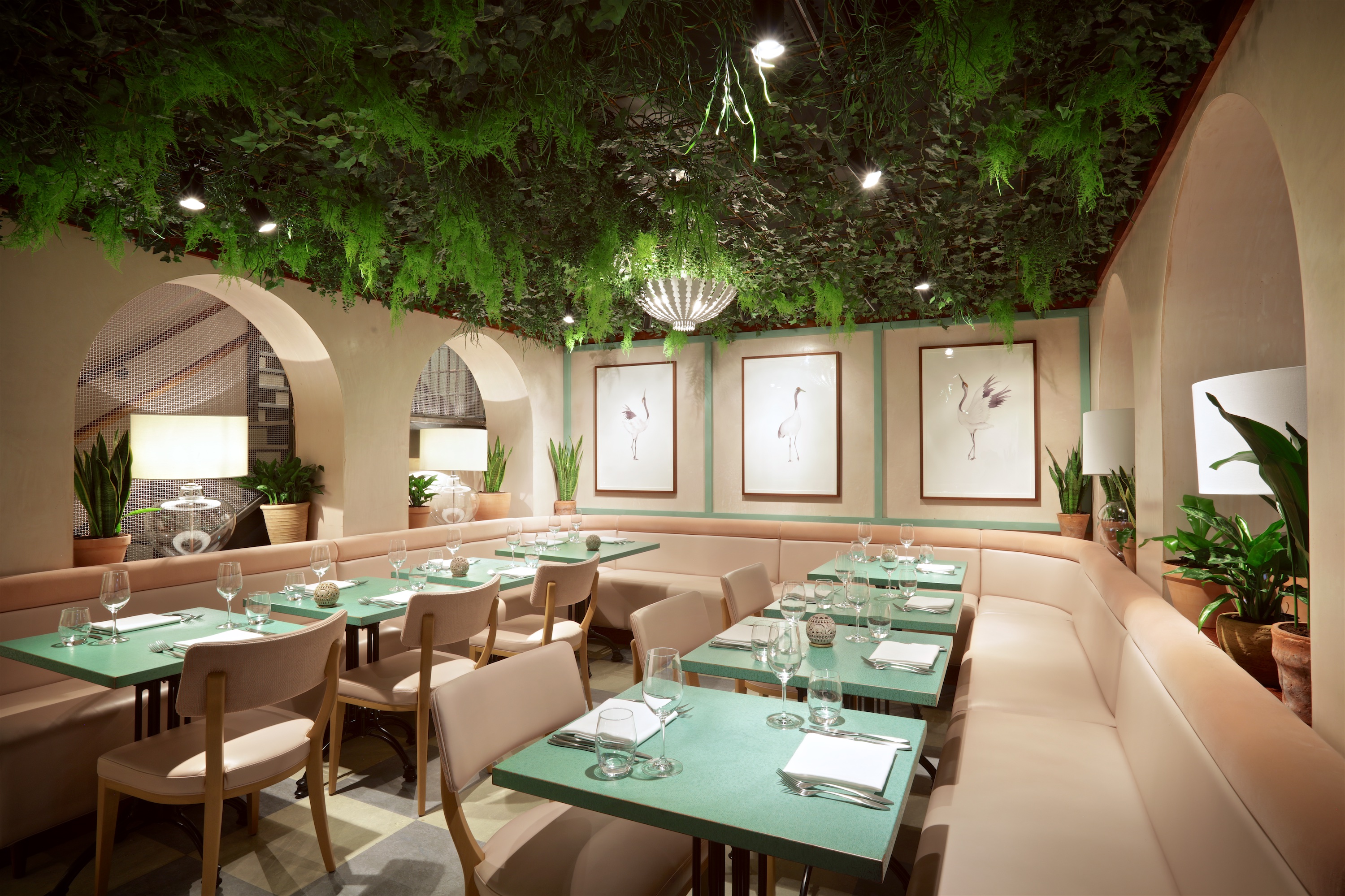 Elegant dining space in Kanishka Mayfair's Garden Room for events and gatherings.