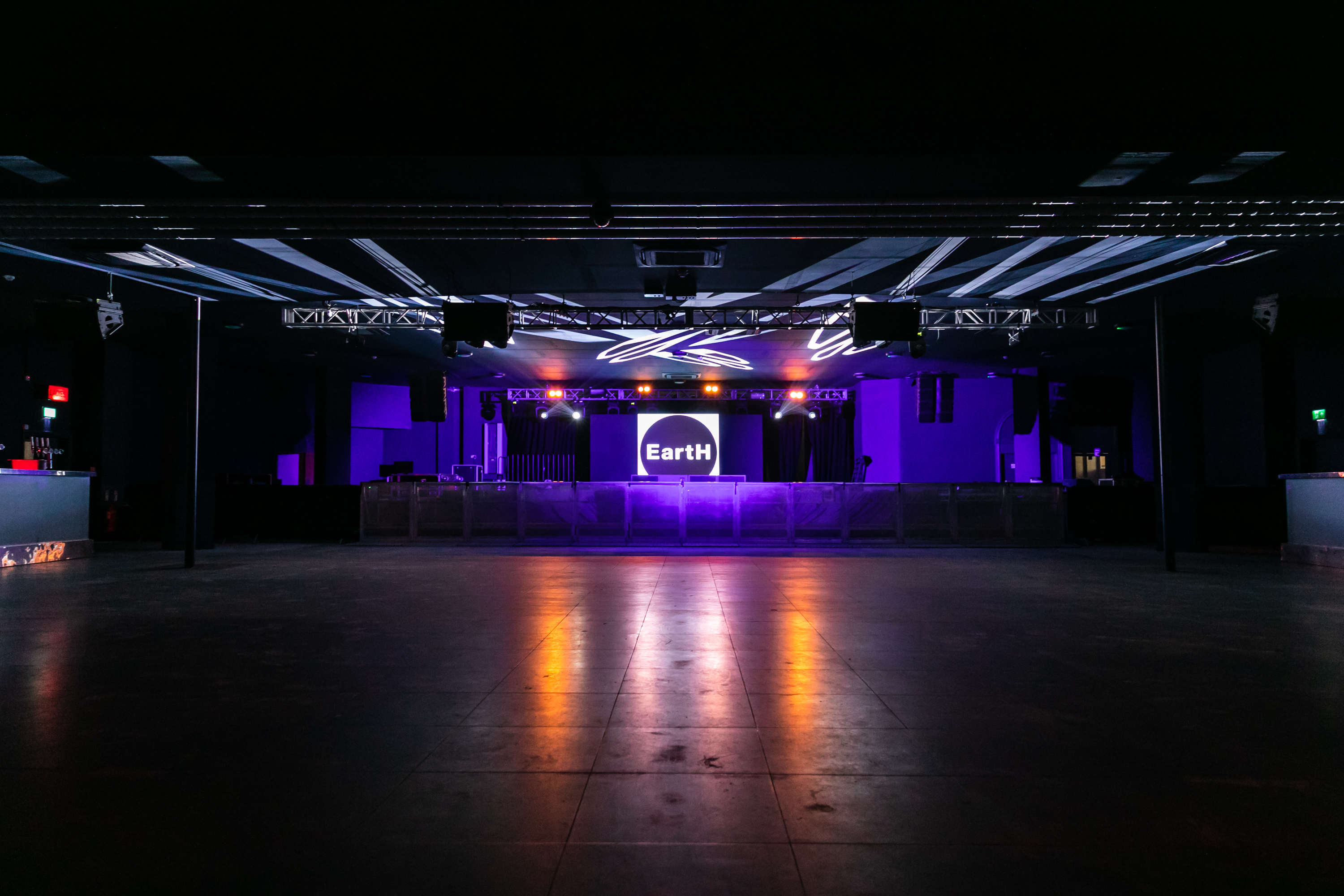 Versatile Concert Hall with stage, ideal for concerts and corporate events.