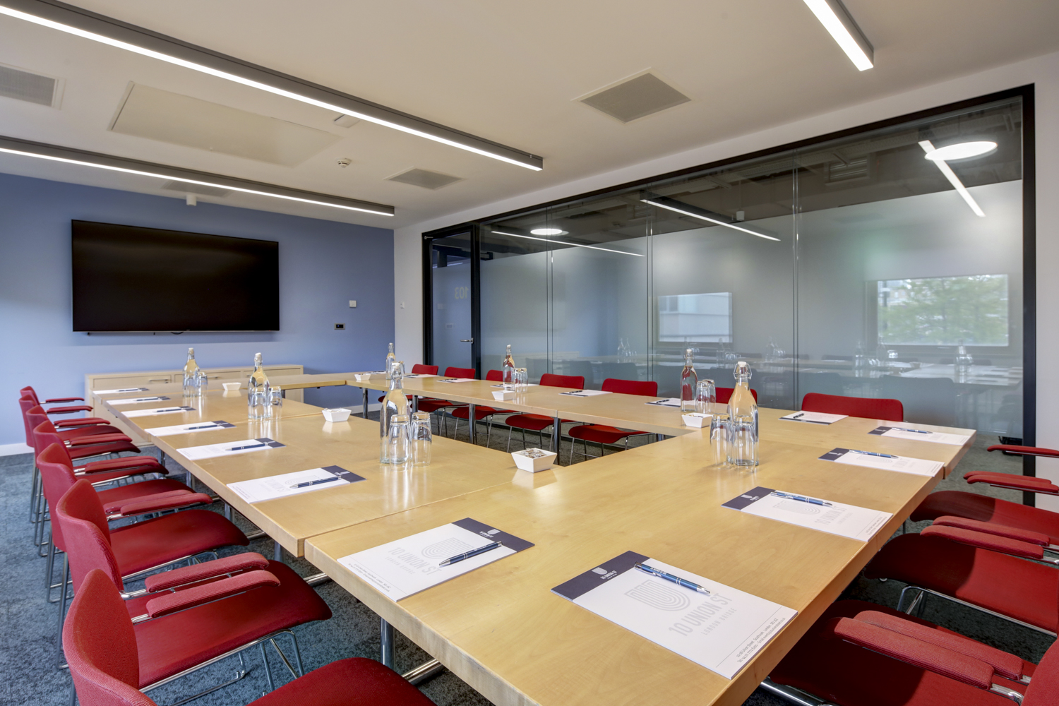 Boardroom meeting, U-shaped table, corporate event, workshop