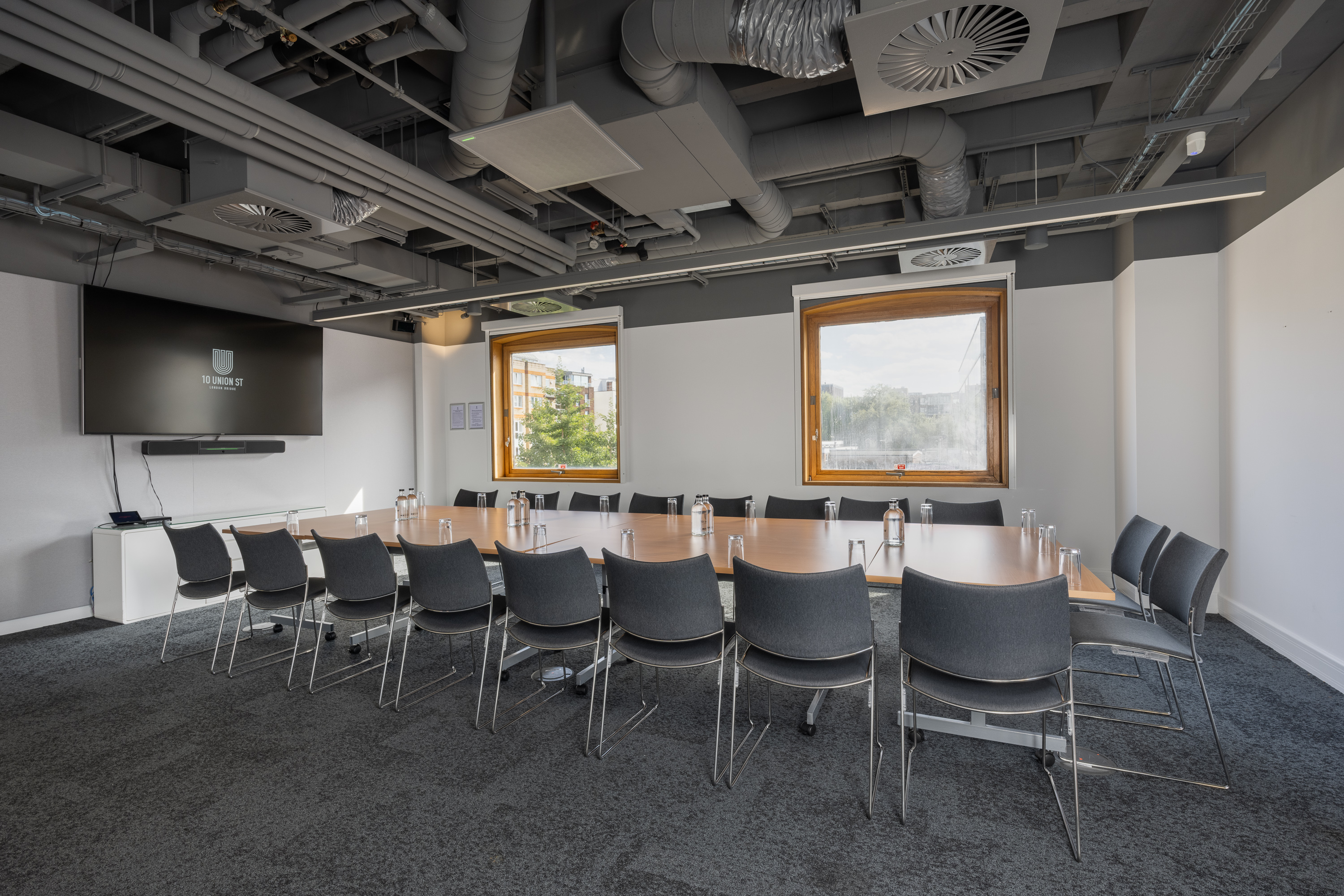 Industrial boardroom at 10 Union Street with natural light for meetings and corporate events.