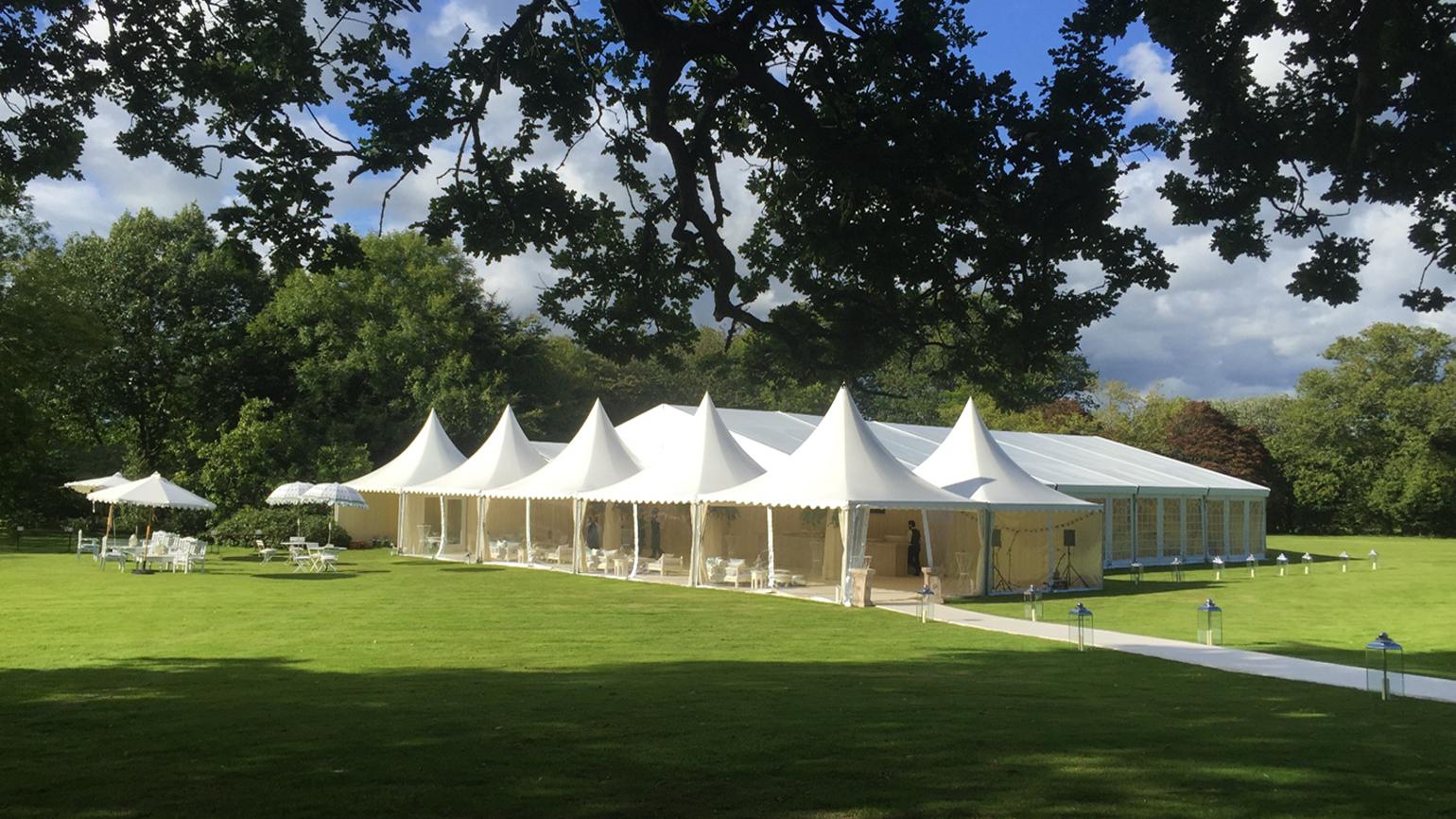 Elegant marquee on Croquet Lawn, Wakehurst, perfect for weddings and corporate events. - Banner
