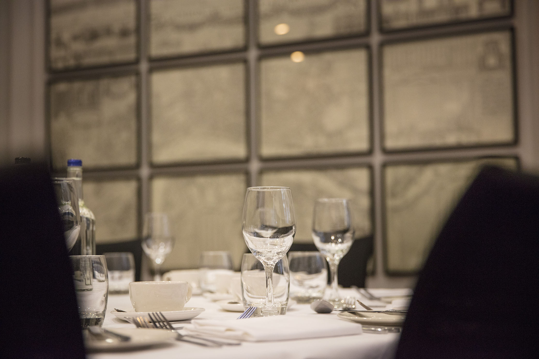Elegant dining table setup for corporate dinner in Thistle Holborn, featuring glassware.