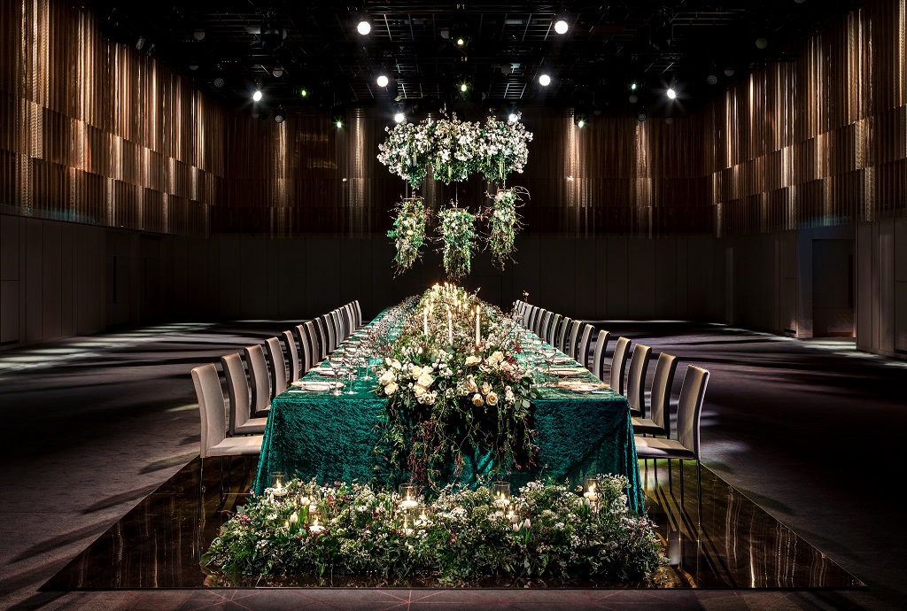 Elegant banquet table with floral arrangements in Ballroom B, perfect for weddings and galas.