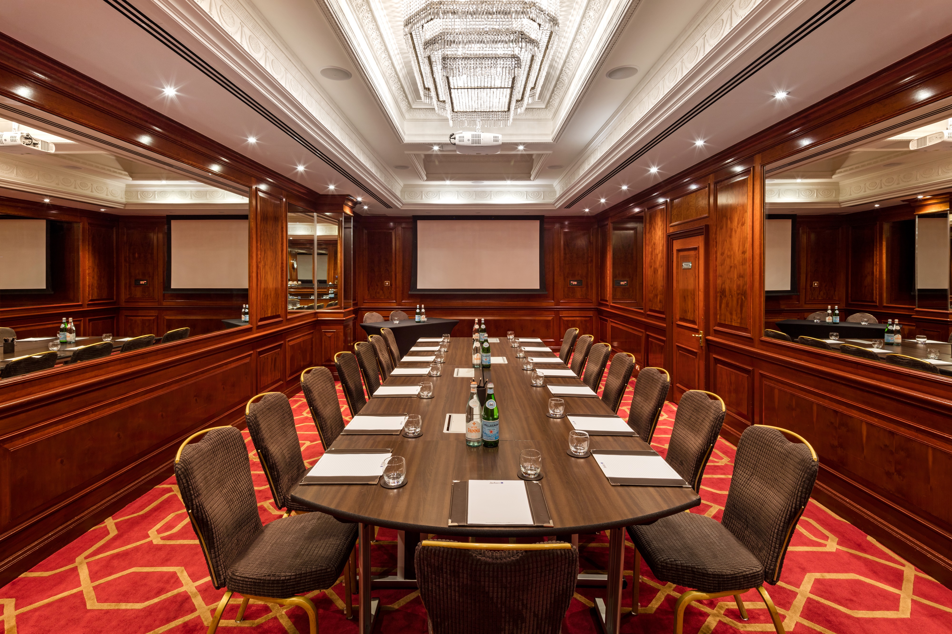 Private Room 32 at Radisson Blu Heathrow, elegant meeting space for workshops and conferences.