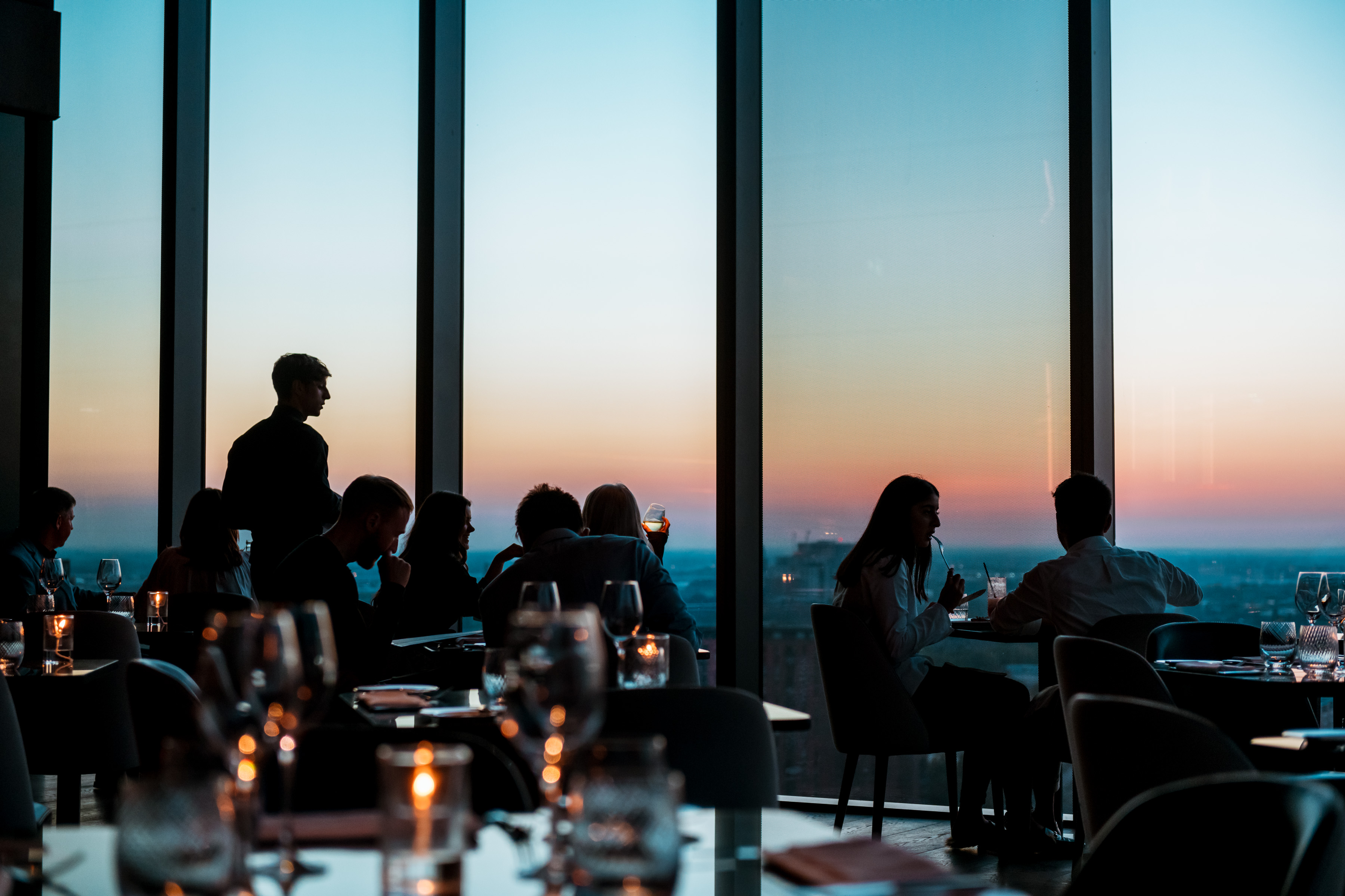 Sophisticated event space with sunset view at 20 Stories Restaurant for networking events.