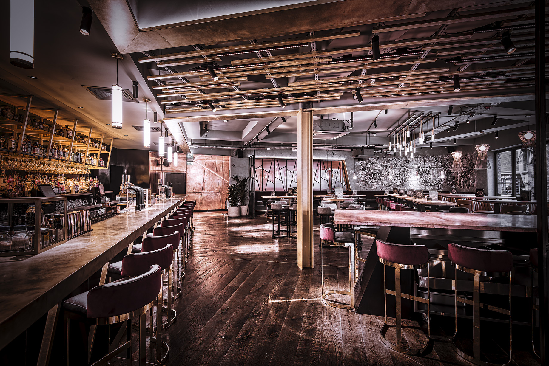 Modern bar area at The Alchemist Brindleyplace, perfect for networking events.