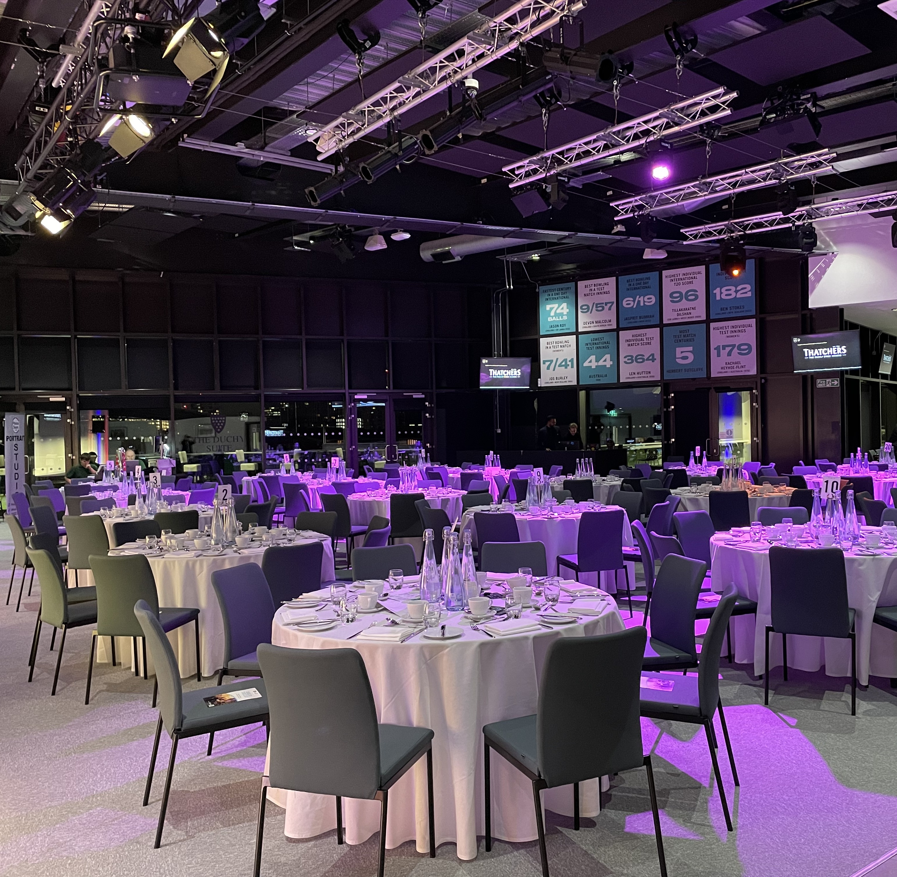 Duchy Suite at Kia Oval: Banquet-style event space with professional corporate AV branding.