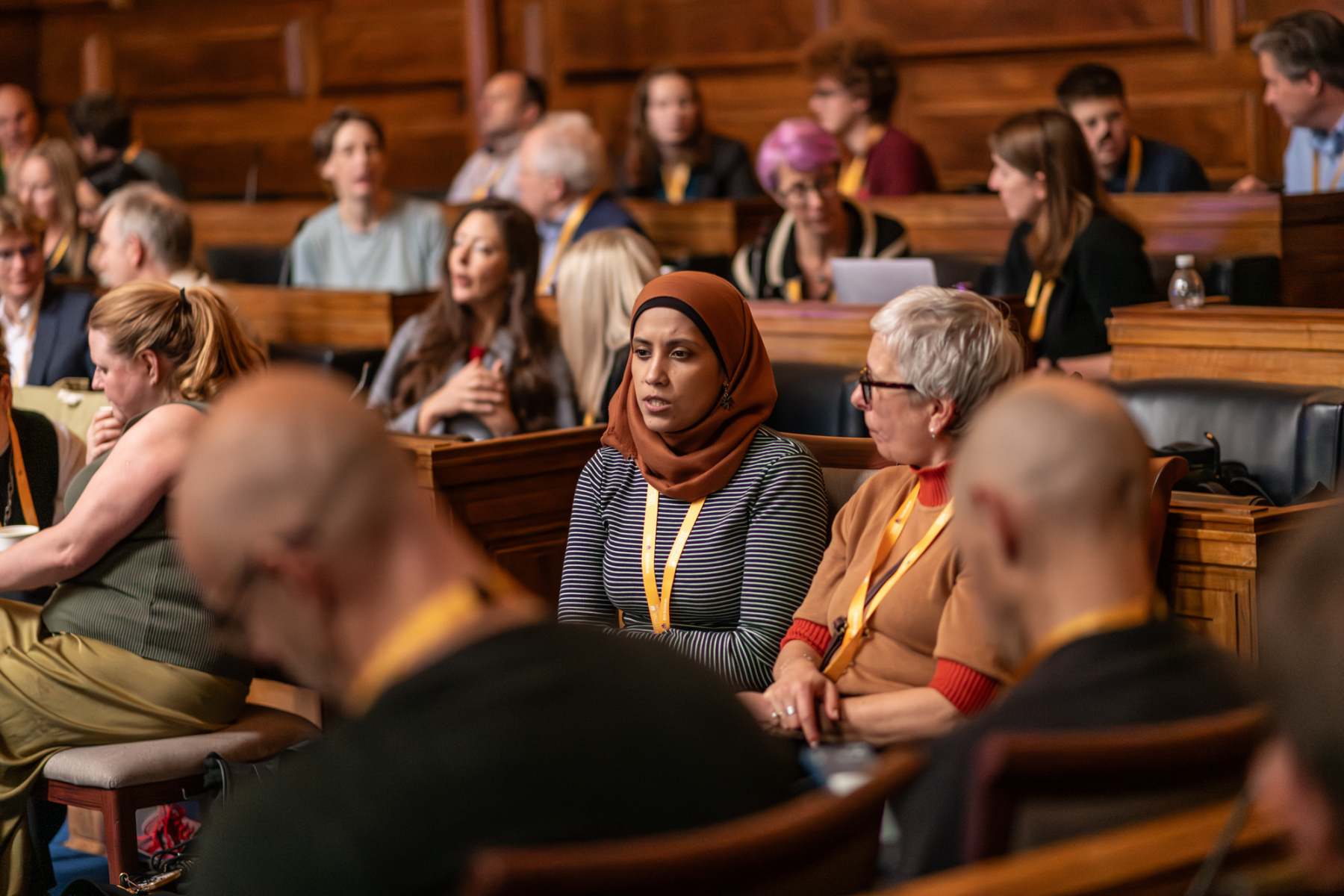 UoL Senate House keynote, audience in tiered seating, event networking