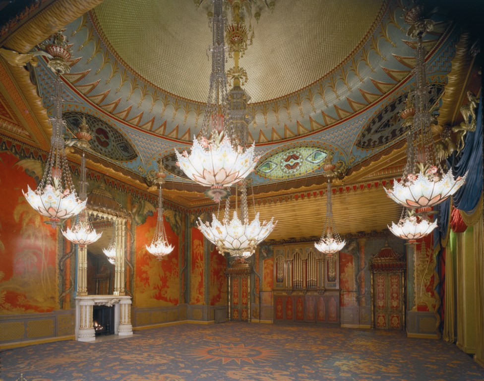 Opulent Music Room in Royal Pavilion with stunning chandeliers for luxury events.