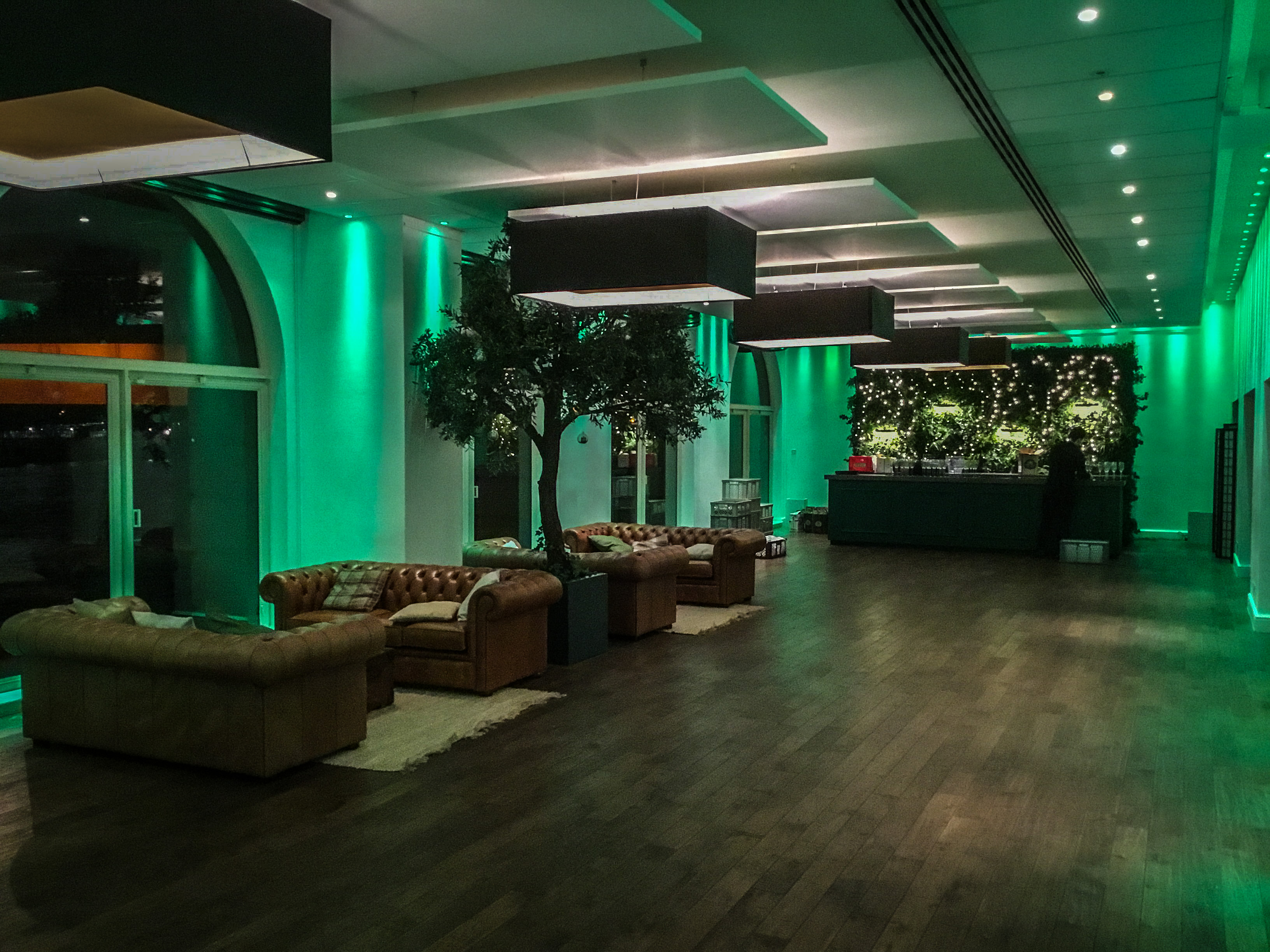 Stylish River Room at Glaziers Hall with cozy seating, perfect for networking events.