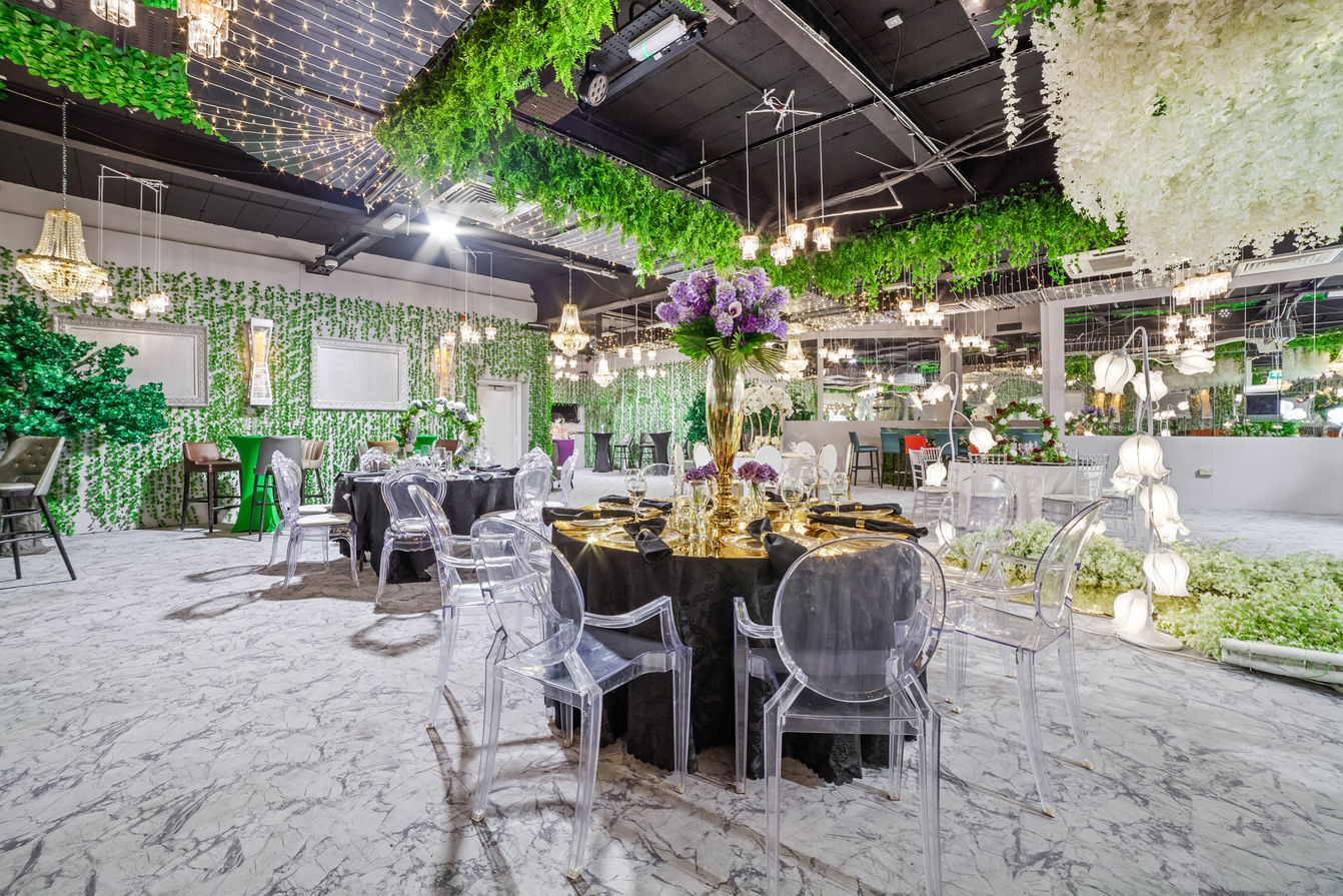 Main Hall secret garden event space with vertical greenery for luxury dining and gala events.