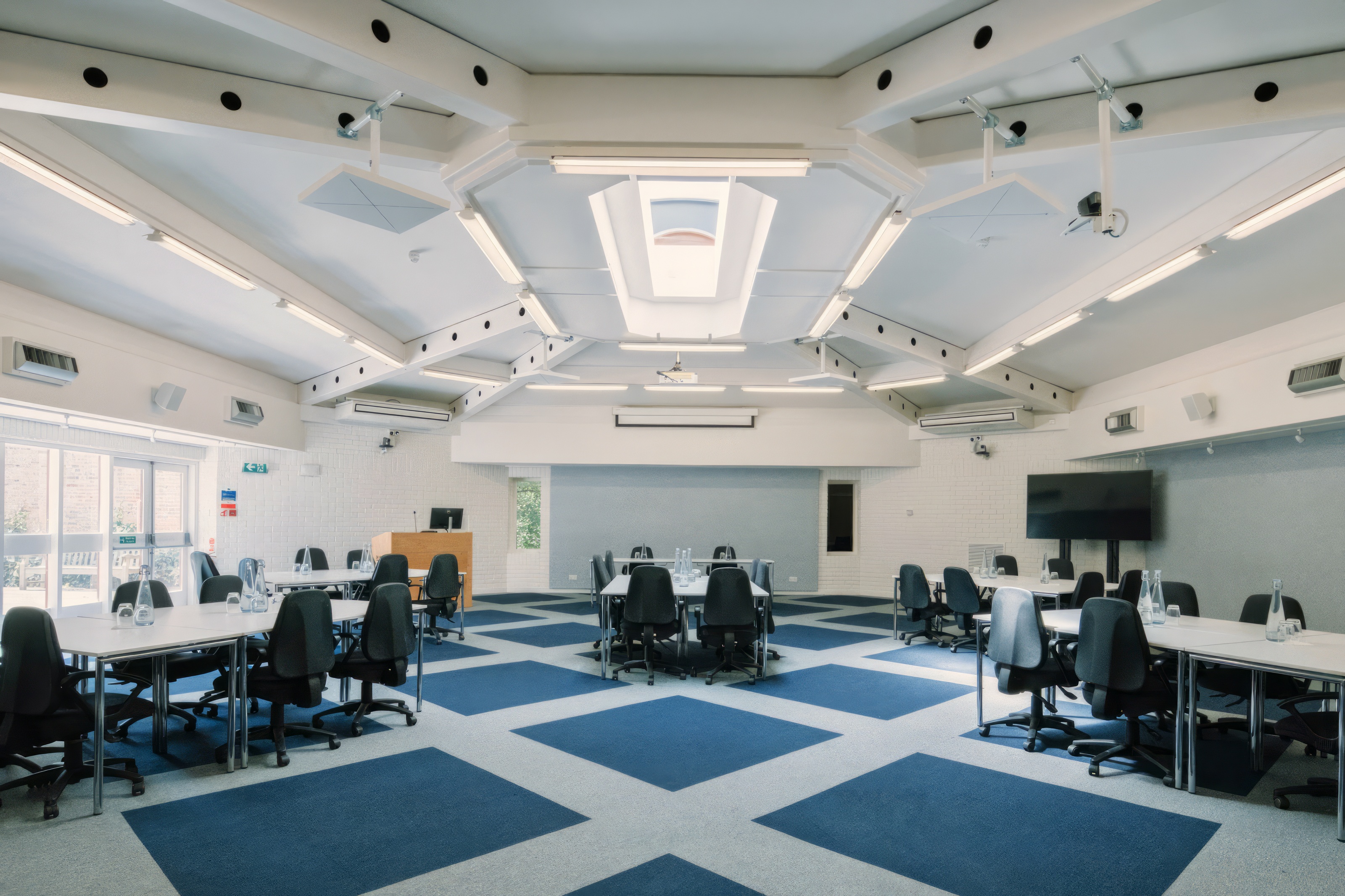 Brindley conference space at Ashridge House with modern modular seating for business workshops.