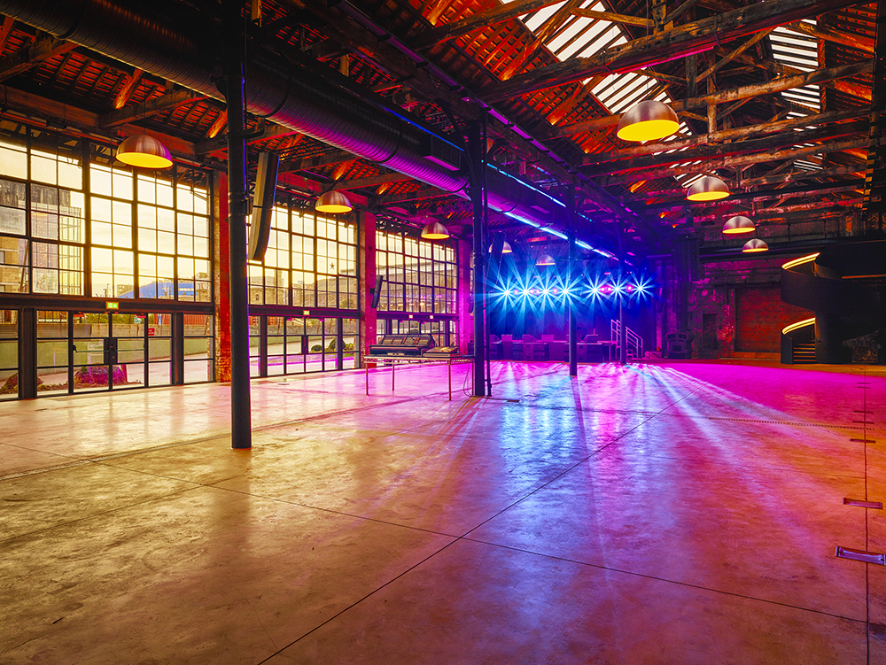 Spacious Boiler Shop event venue with high ceilings, perfect for gatherings and receptions. - Banner
