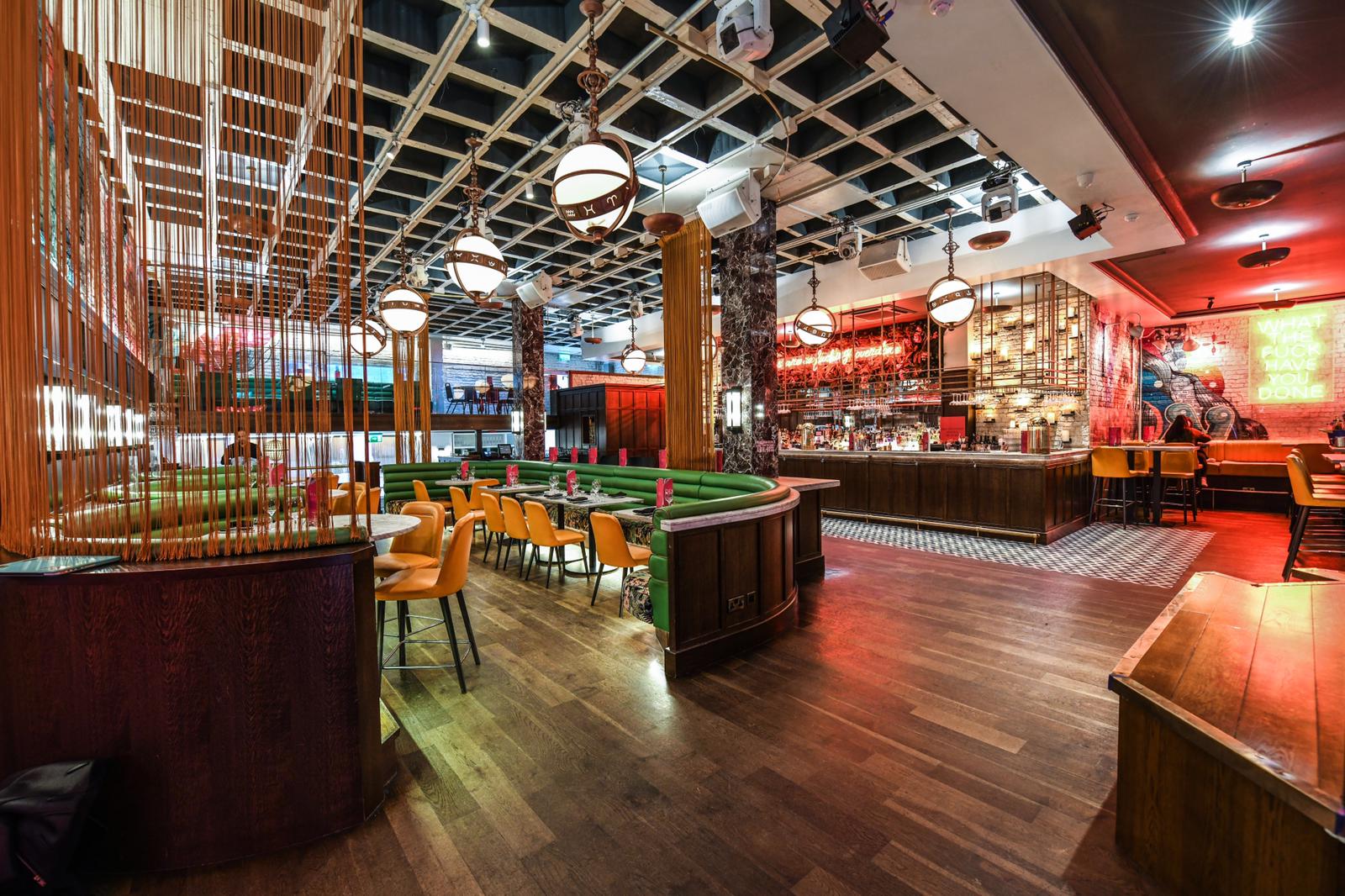 Modern event venue with vibrant decor and flexible seating in BLVD Spinningfields.