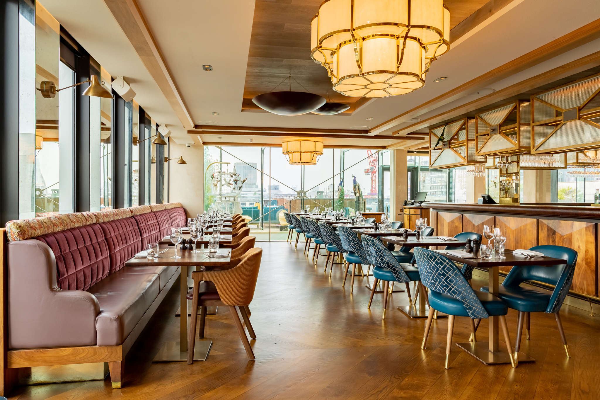 Stylish 10th floor restaurant venue with elegant decor for networking events and private dinners.