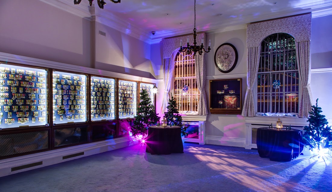Medal Room at The HAC with elegant display cabinets, perfect for festive corporate events.