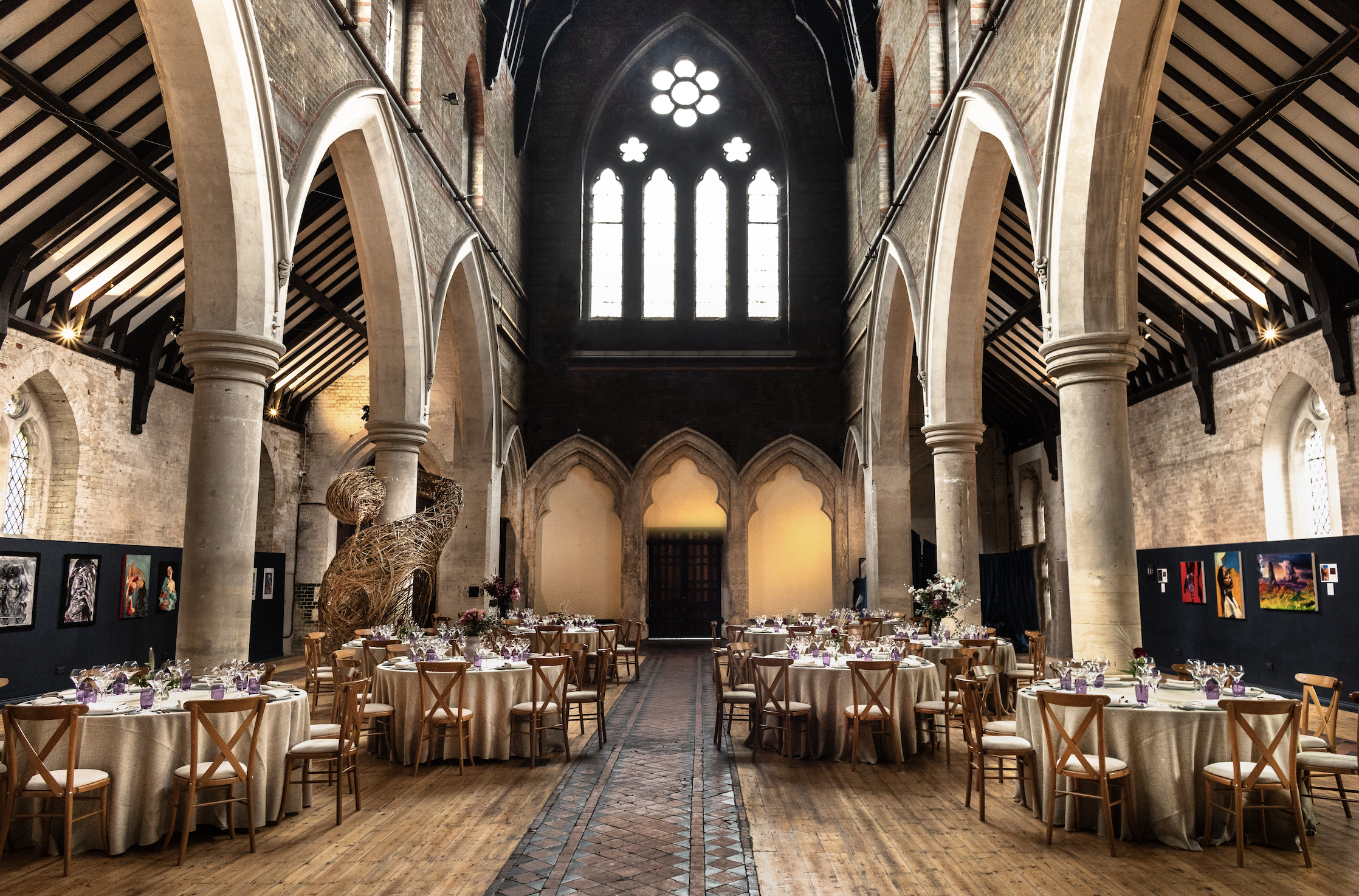 Elegant event space with vaulted ceilings, perfect for weddings and corporate events. - Banner