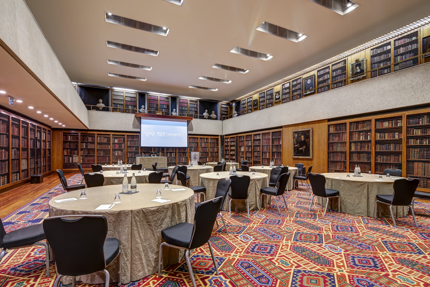Dorchester Library meeting space with elegant round tables for conferences and workshops.
