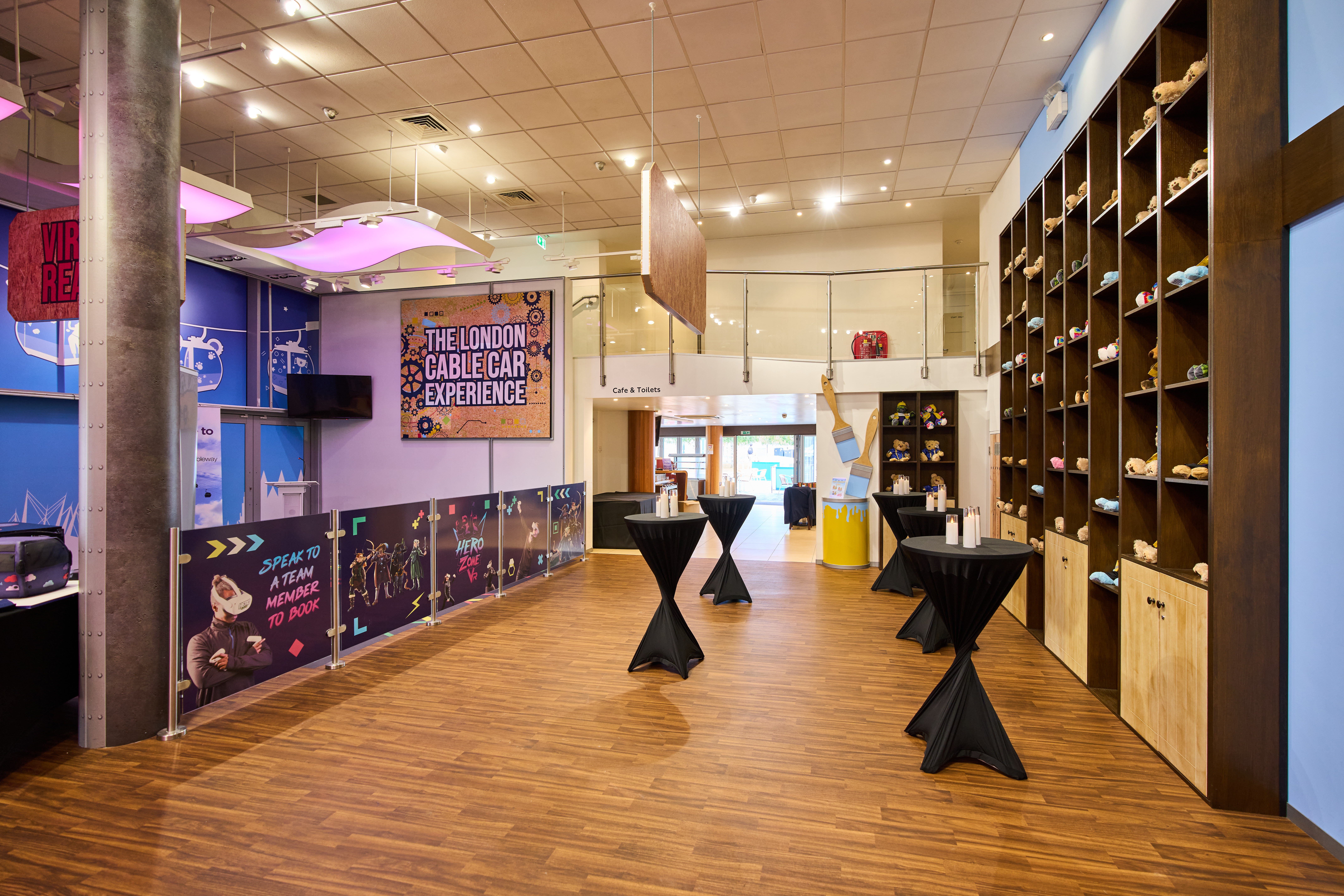 Modern Main Hall in London Cable Car for meetings and gatherings, vibrant decor.