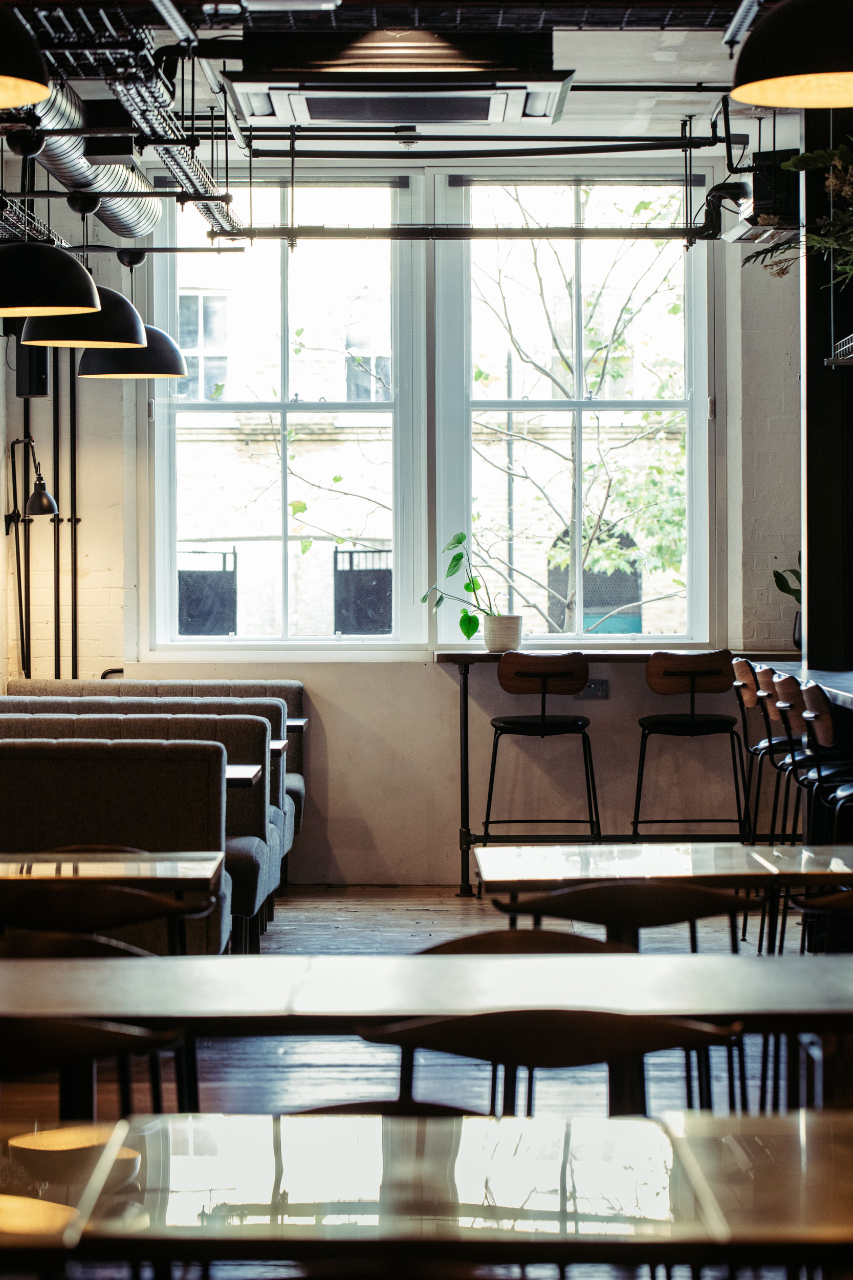 The Lounge at The Ministry: flexible booth and bar seating for coworking and networking events.